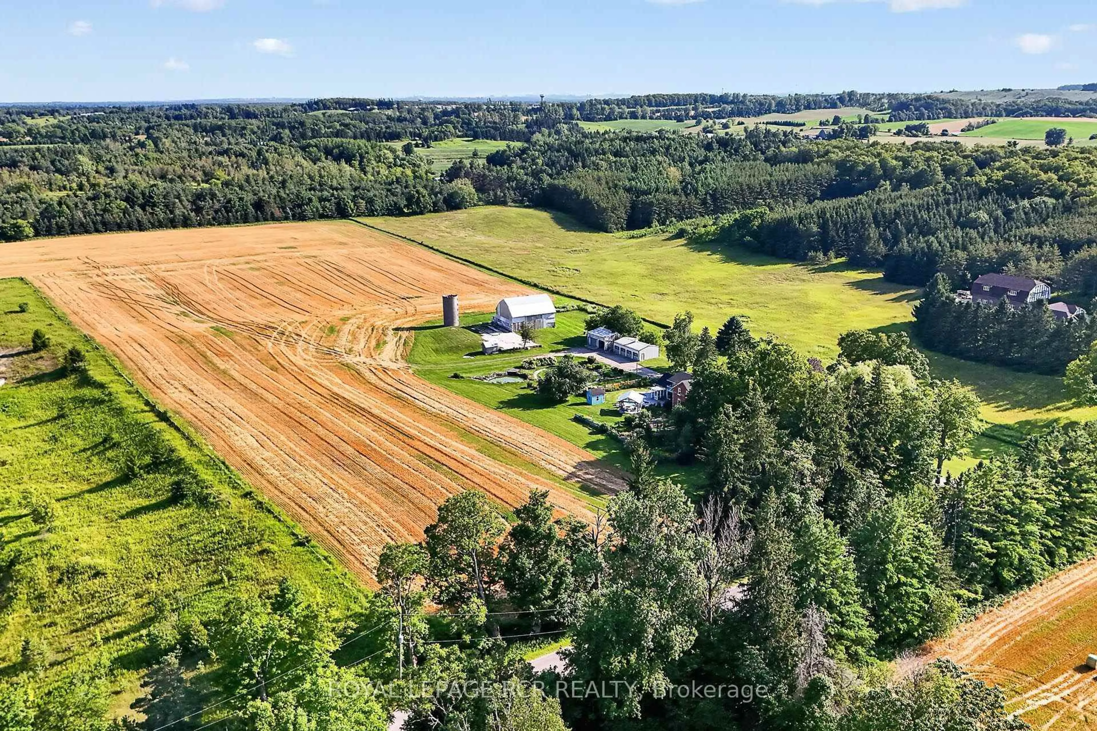 A pic from outside/outdoor area/front of a property/back of a property/a pic from drone, forest/trees view for 233 Wagg Rd, Uxbridge Ontario L9P 0G1
