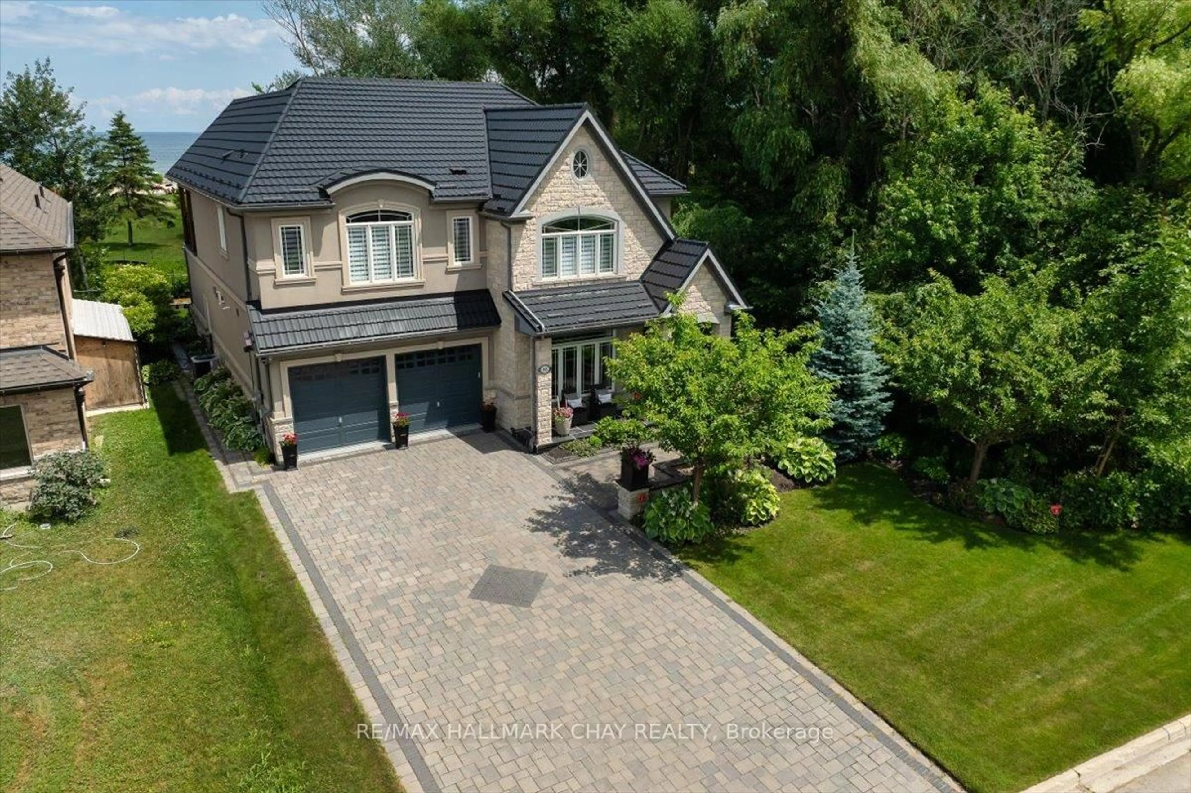 A pic from outside/outdoor area/front of a property/back of a property/a pic from drone, street for 665 Park Rd, Innisfil Ontario L9S 2E1