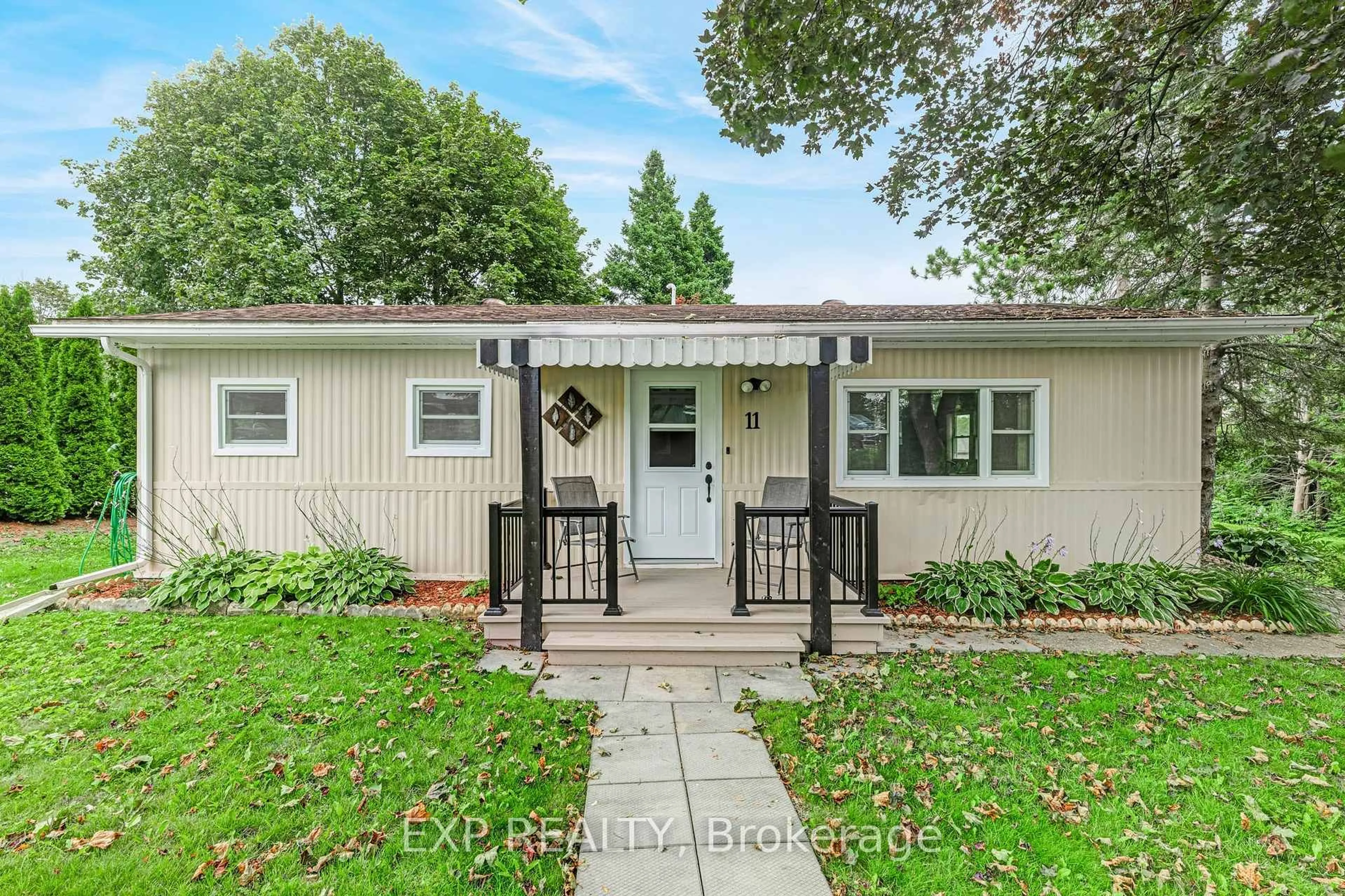 Home with vinyl exterior material, street for 11 Hawthorne Dr, Innisfil Ontario L9S 1P7