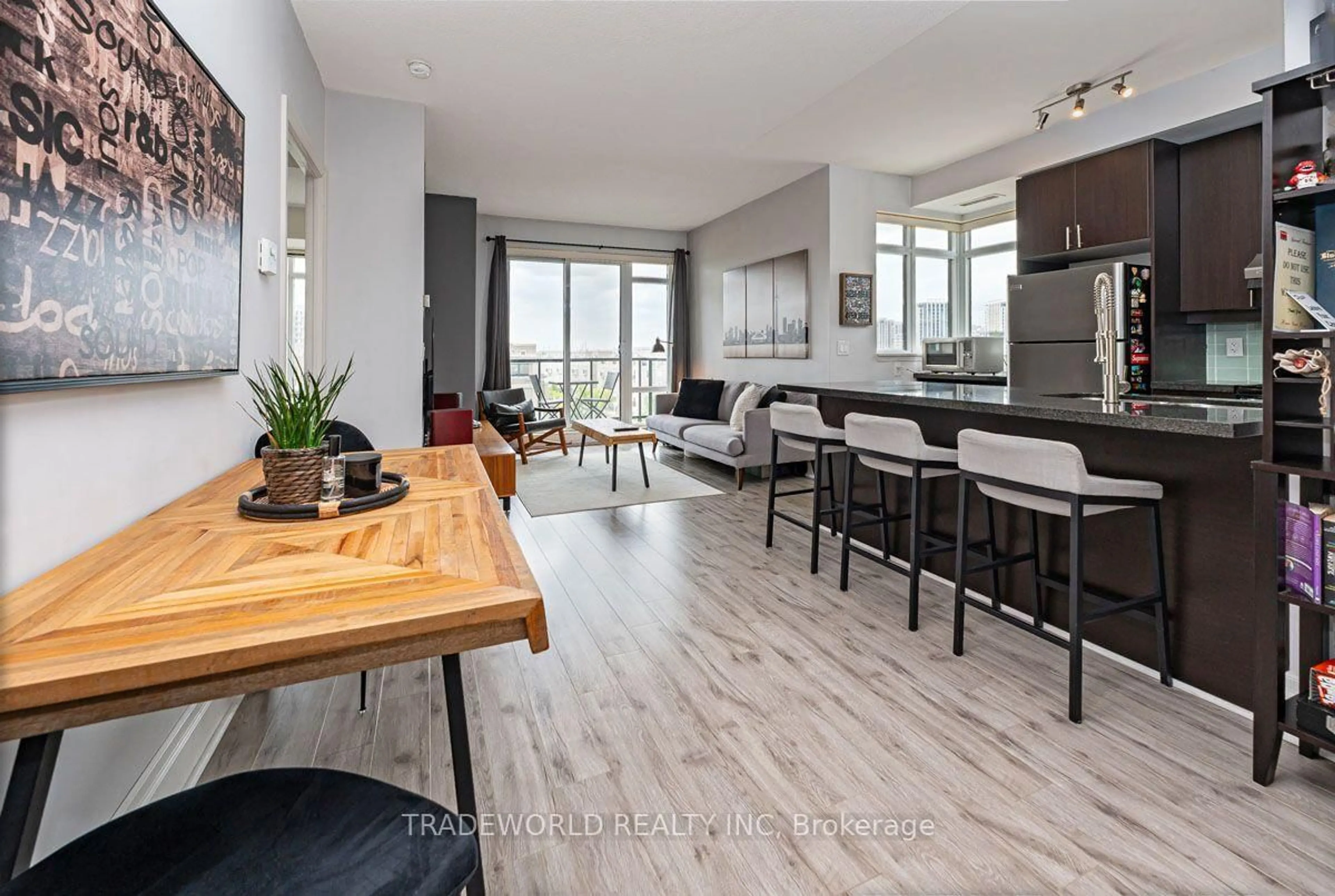 Open concept kitchen, wood/laminate floor for 131 Upper Duke Cres #504, Markham Ontario L6G 0C9