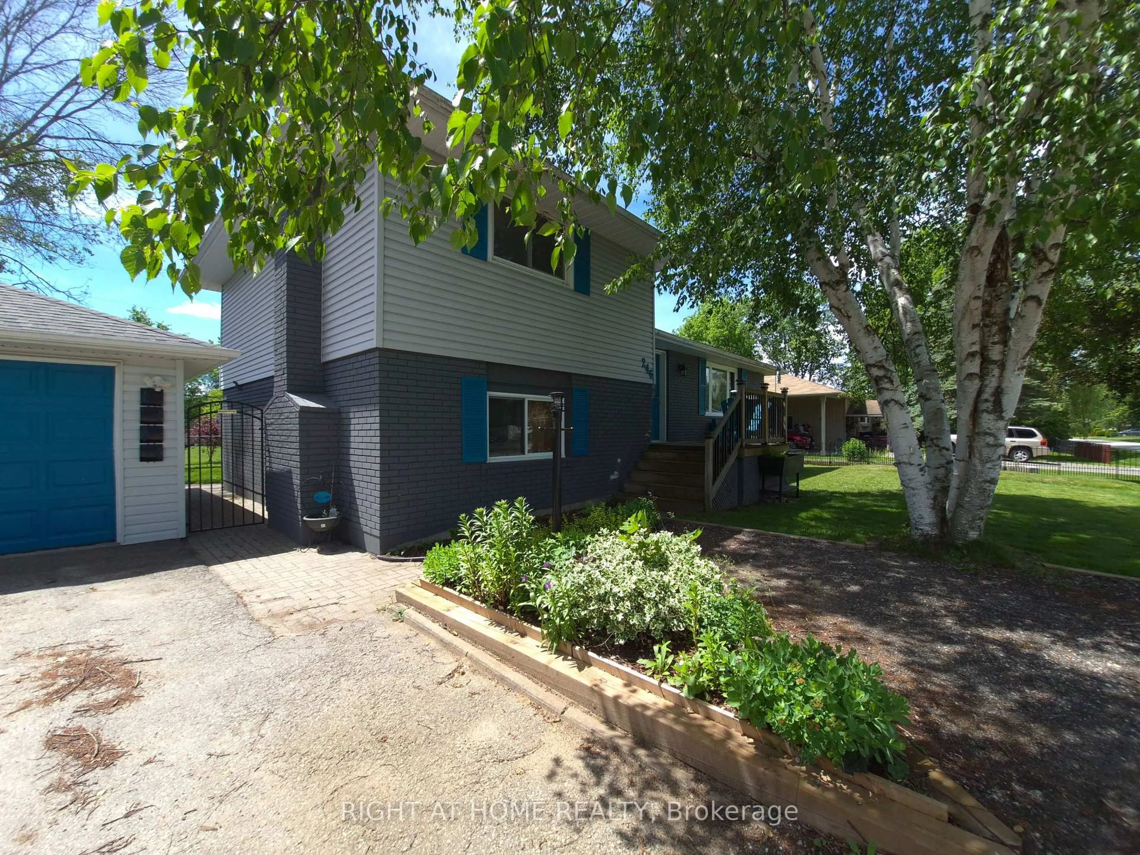 A pic from outside/outdoor area/front of a property/back of a property/a pic from drone, street for 246 Calford St, Essa Ontario L0M 1B0