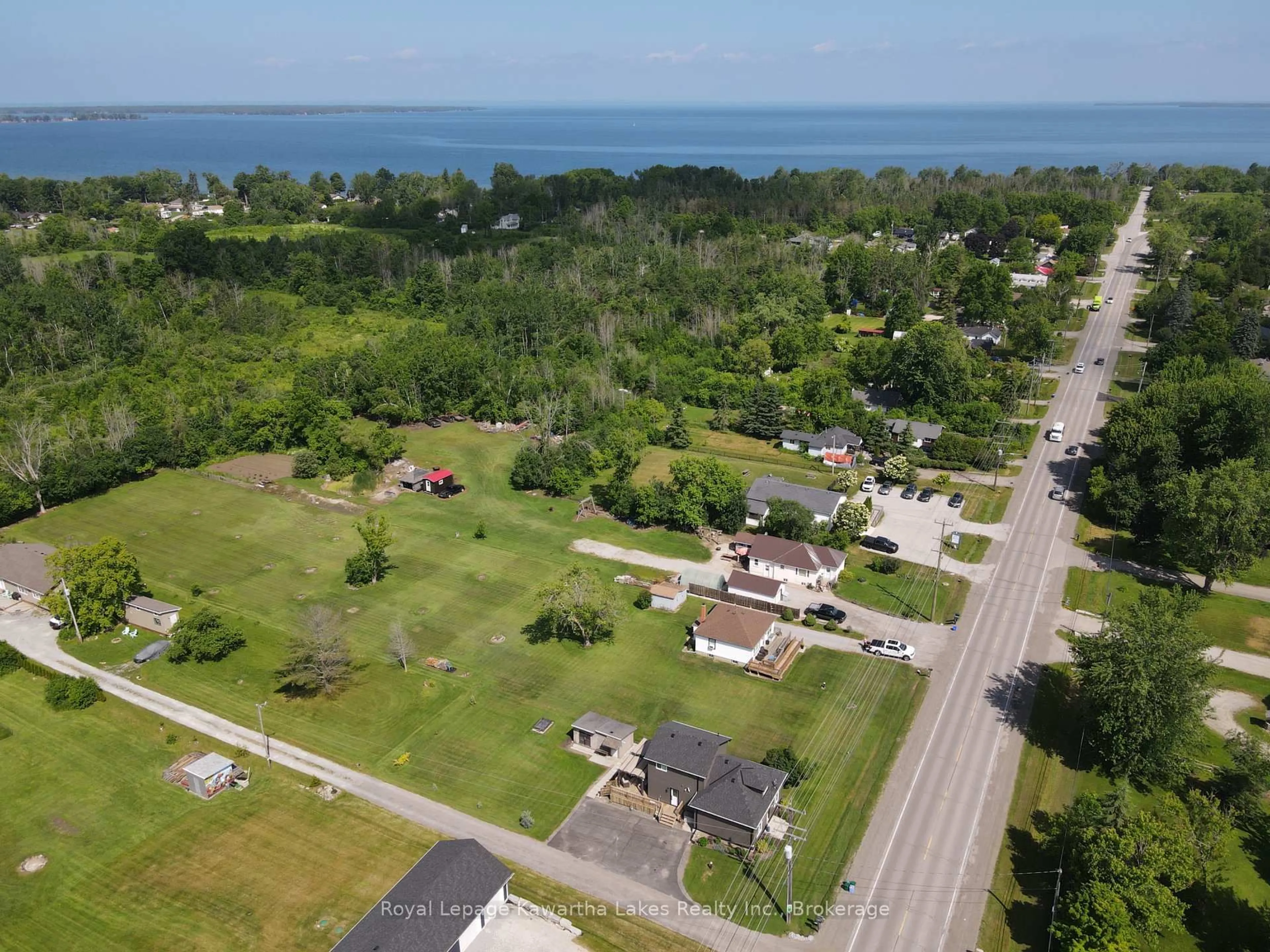 A pic from outside/outdoor area/front of a property/back of a property/a pic from drone, water/lake/river/ocean view for 31410 Lake Ridge Rd, Georgina Ontario L0E 1N0
