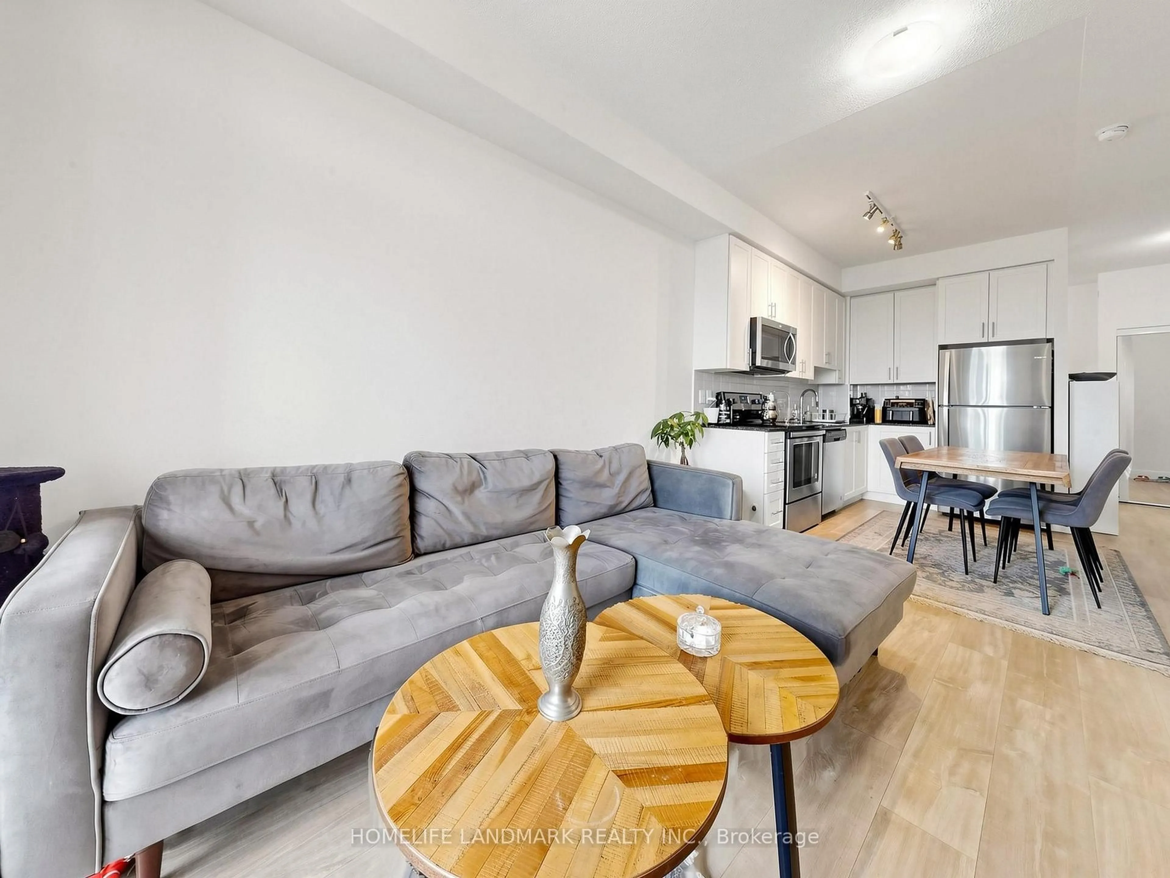 Living room with furniture, wood/laminate floor for 3700 Highway 7 Rd #2212, Vaughan Ontario L4L 0G8