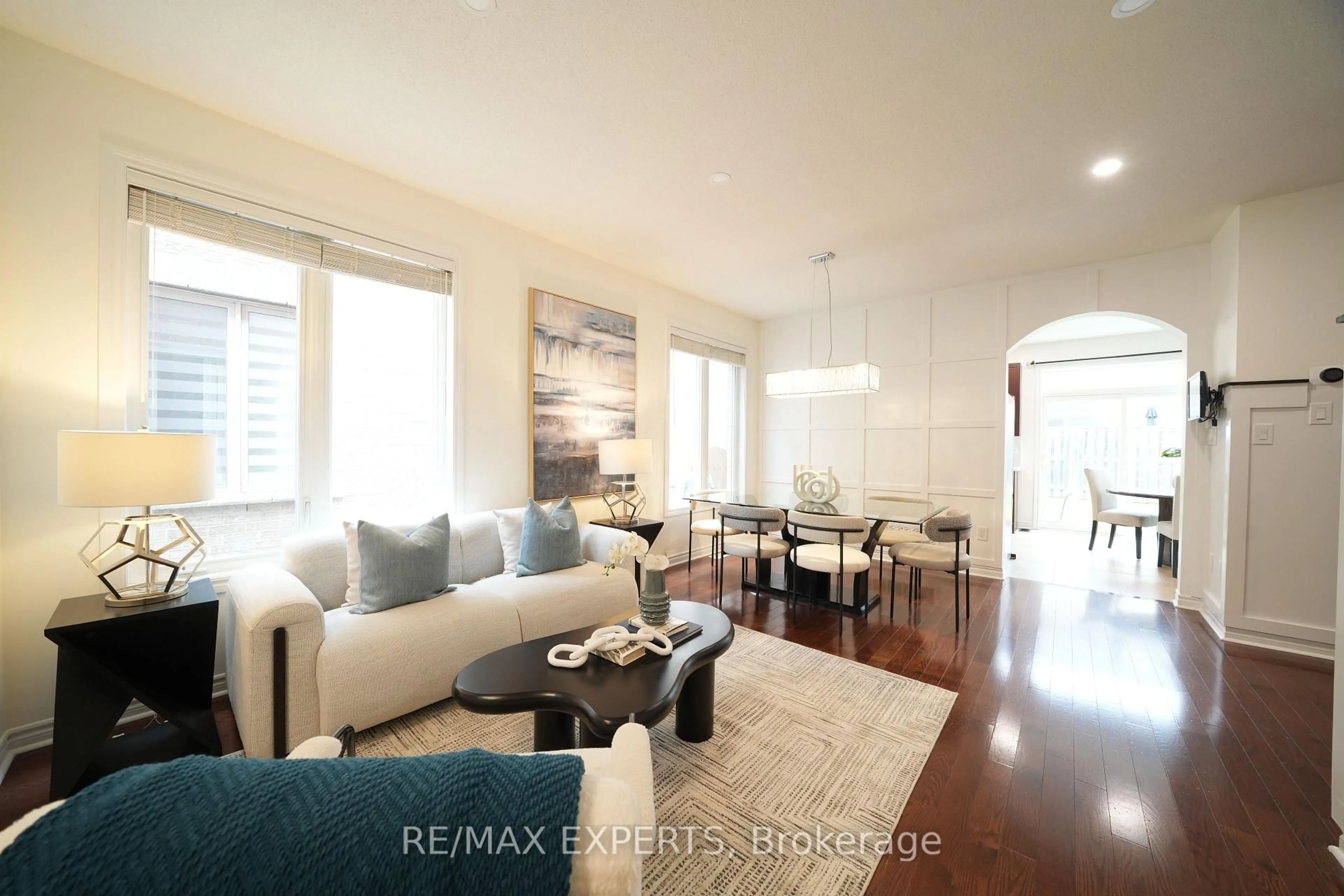 Living room with furniture, wood/laminate floor for 53 Braith Cres, Whitchurch-Stouffville Ontario L4A 0B9