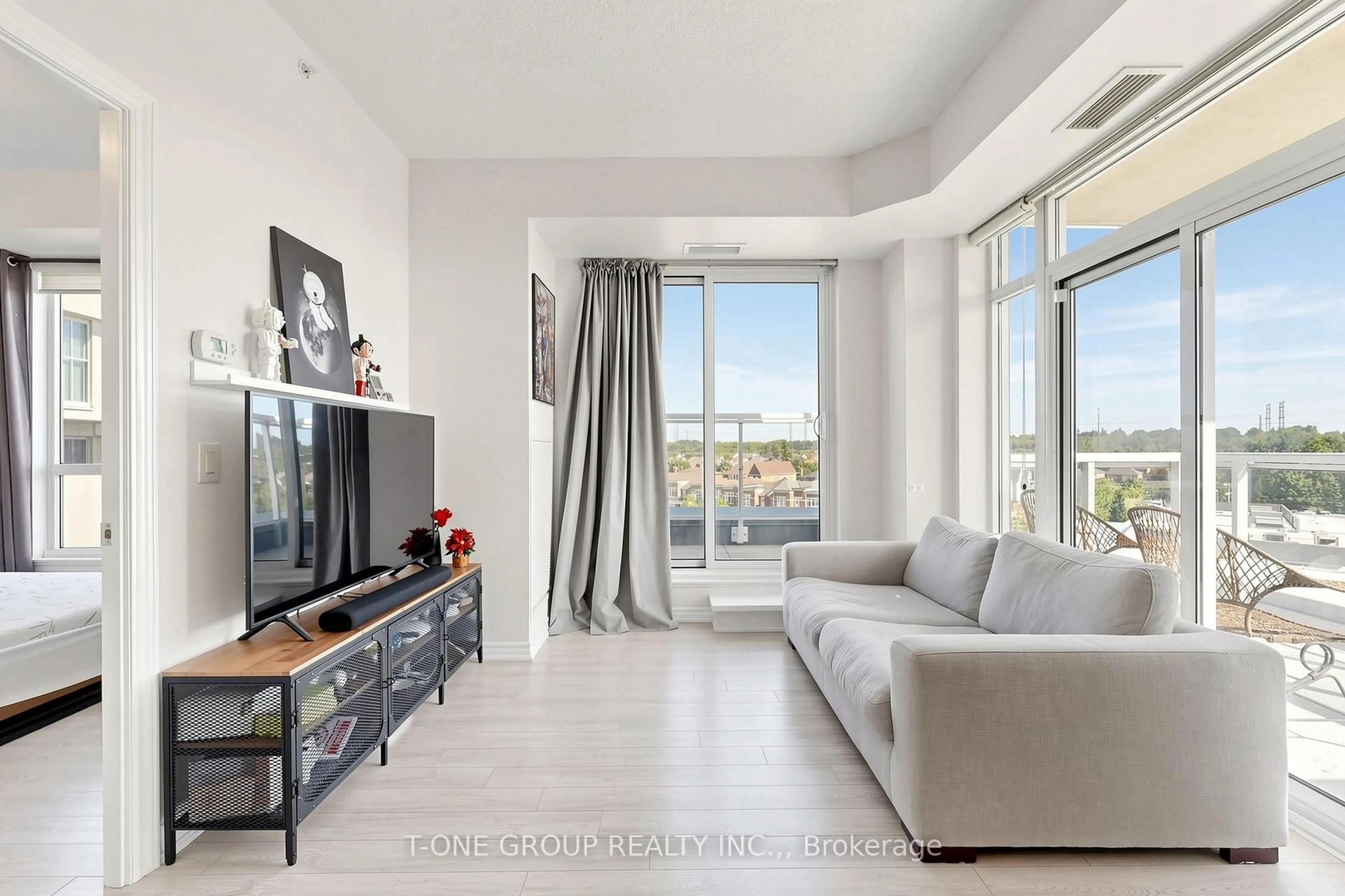 Living room with furniture, unknown for 8323 Kennedy Rd #508, Markham Ontario L3R 5W7