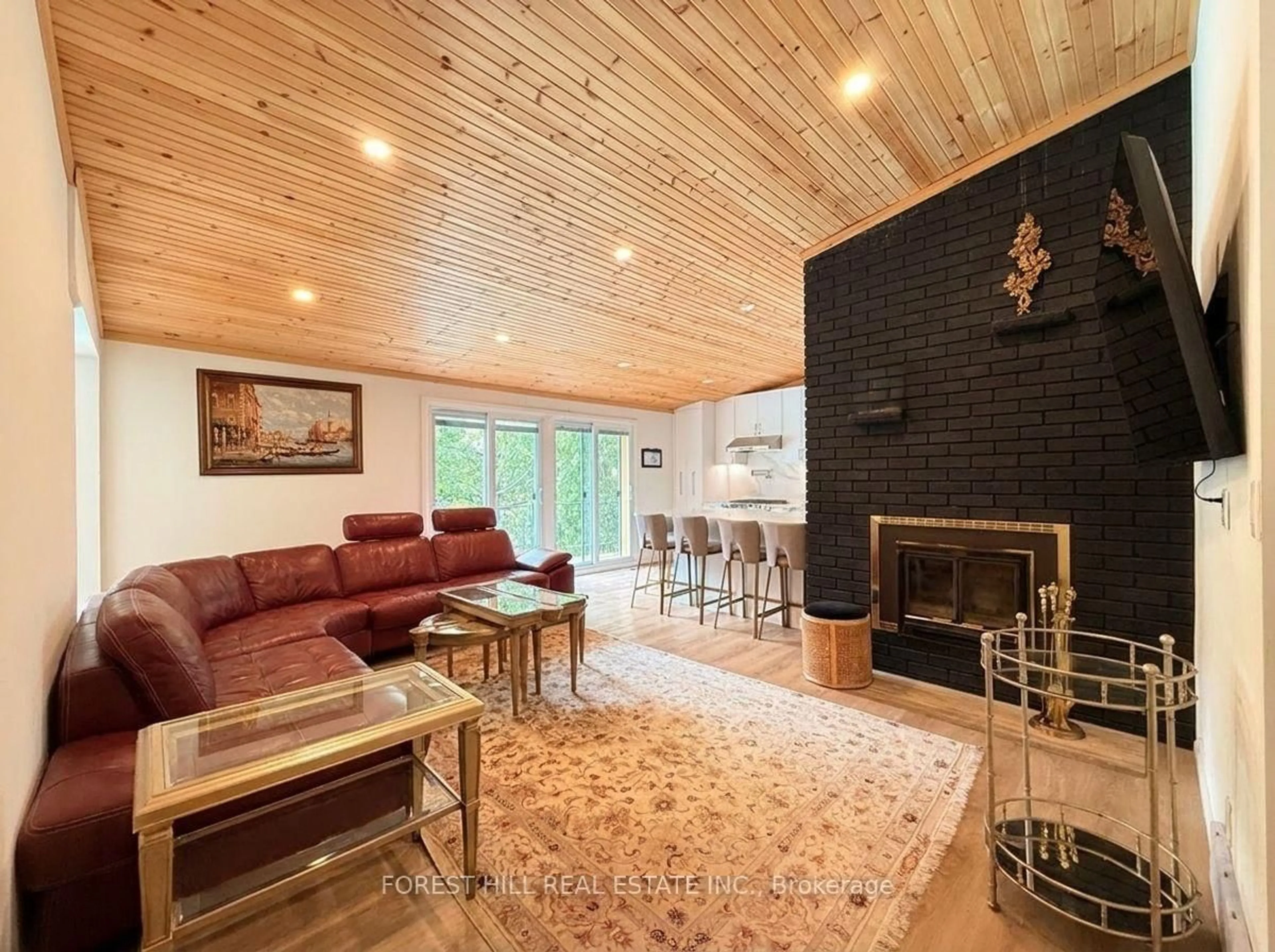 Living room with furniture, wood/laminate floor for 225 Carrville Rd, Richmond Hill Ontario L4C 6E4