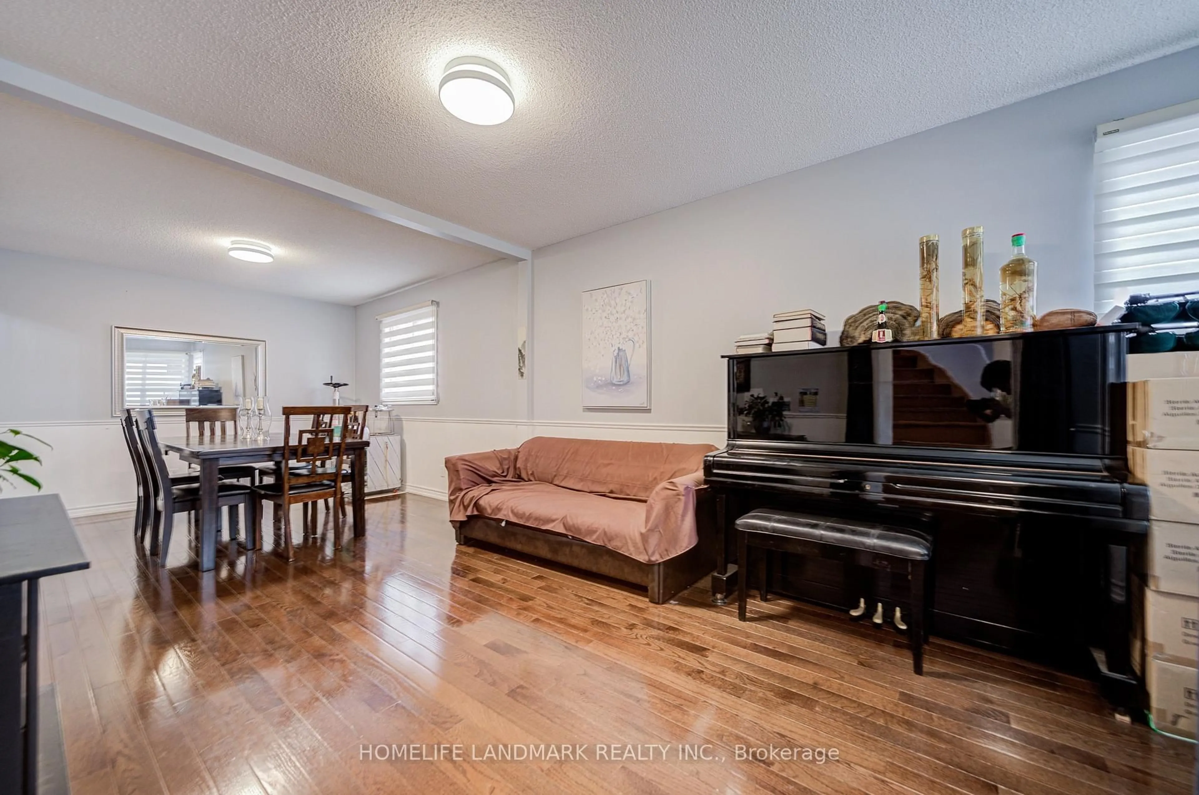 Living room with furniture, wood/laminate floor for 35 Royal Palm Dr, Vaughan Ontario L4J 5R4