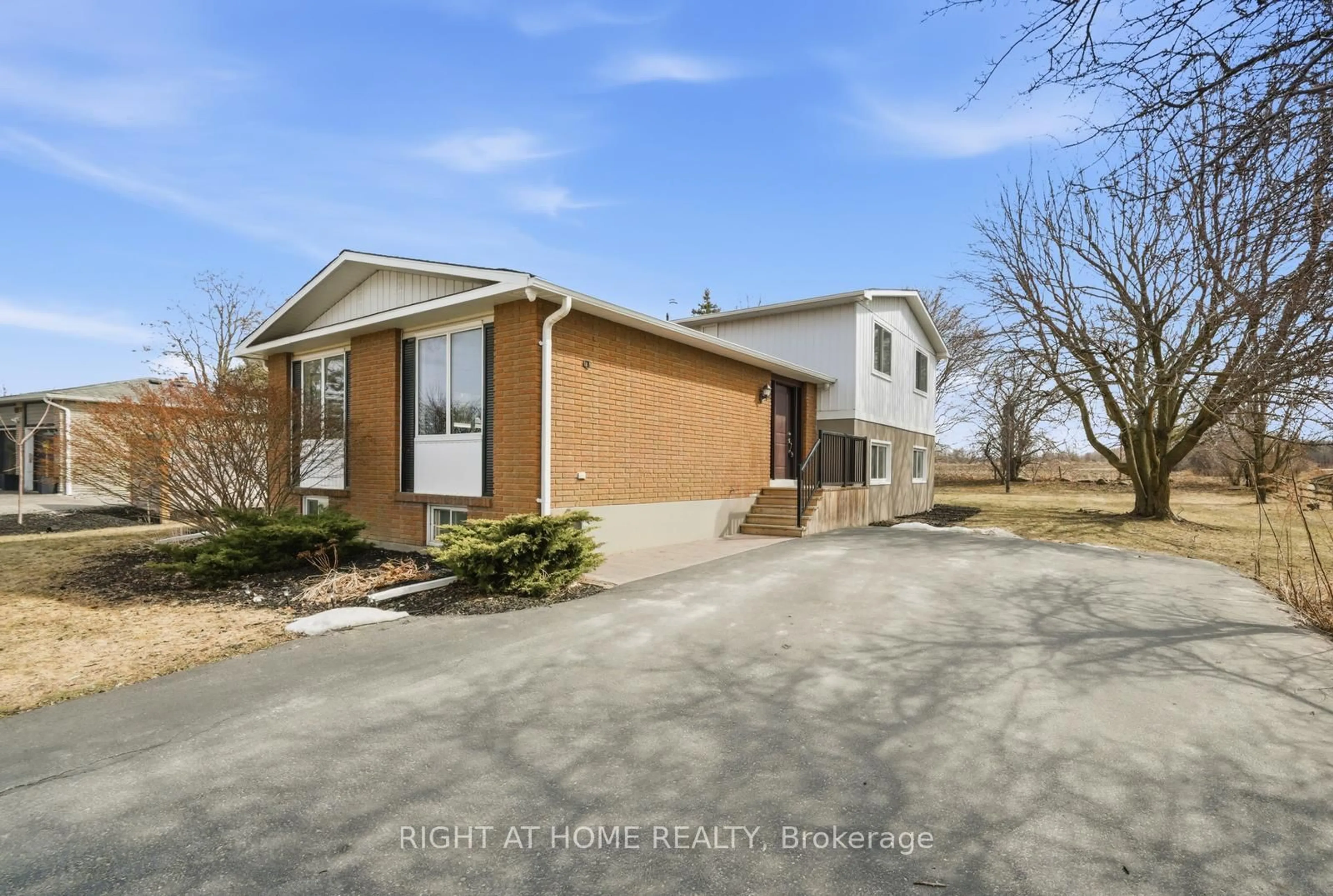 A pic from outside/outdoor area/front of a property/back of a property/a pic from drone, street for 5885 7th Line, New Tecumseth Ontario L0G 1A0