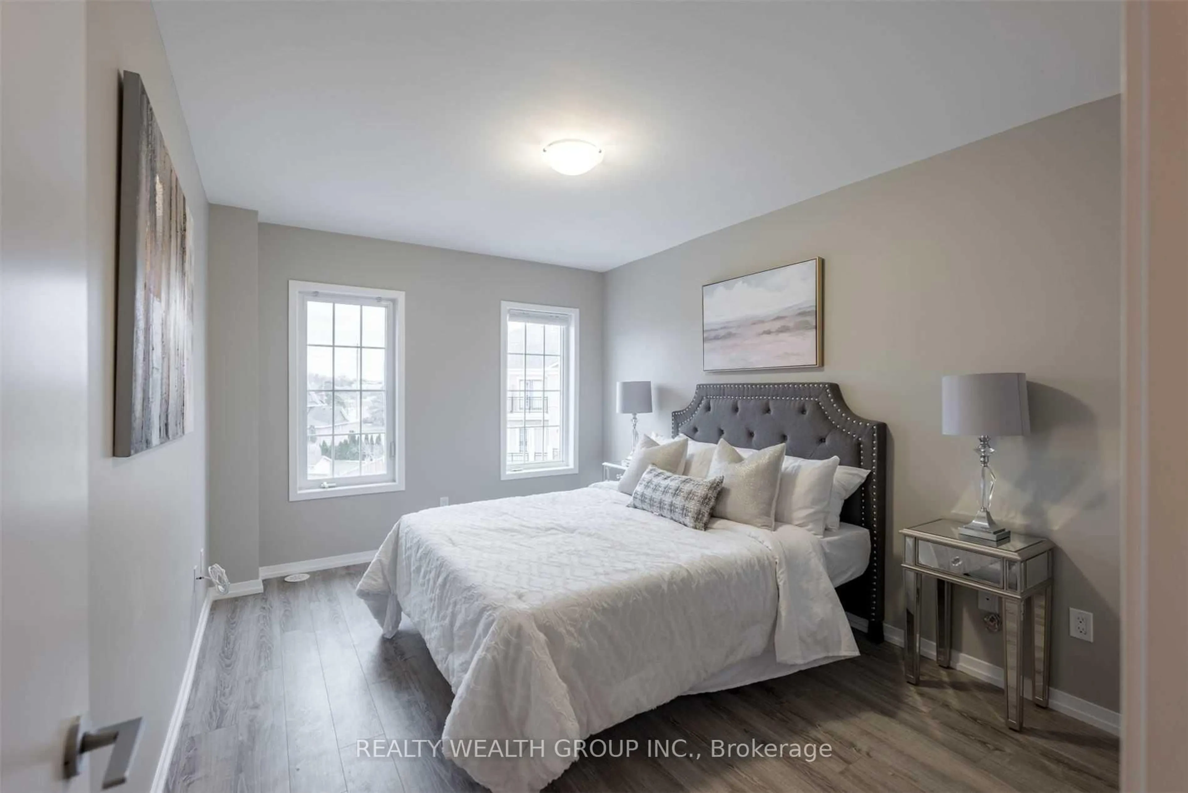 Bedroom with bed, wood/laminate floor for 26 Bruce St #12, Vaughan Ontario L4L 1J4