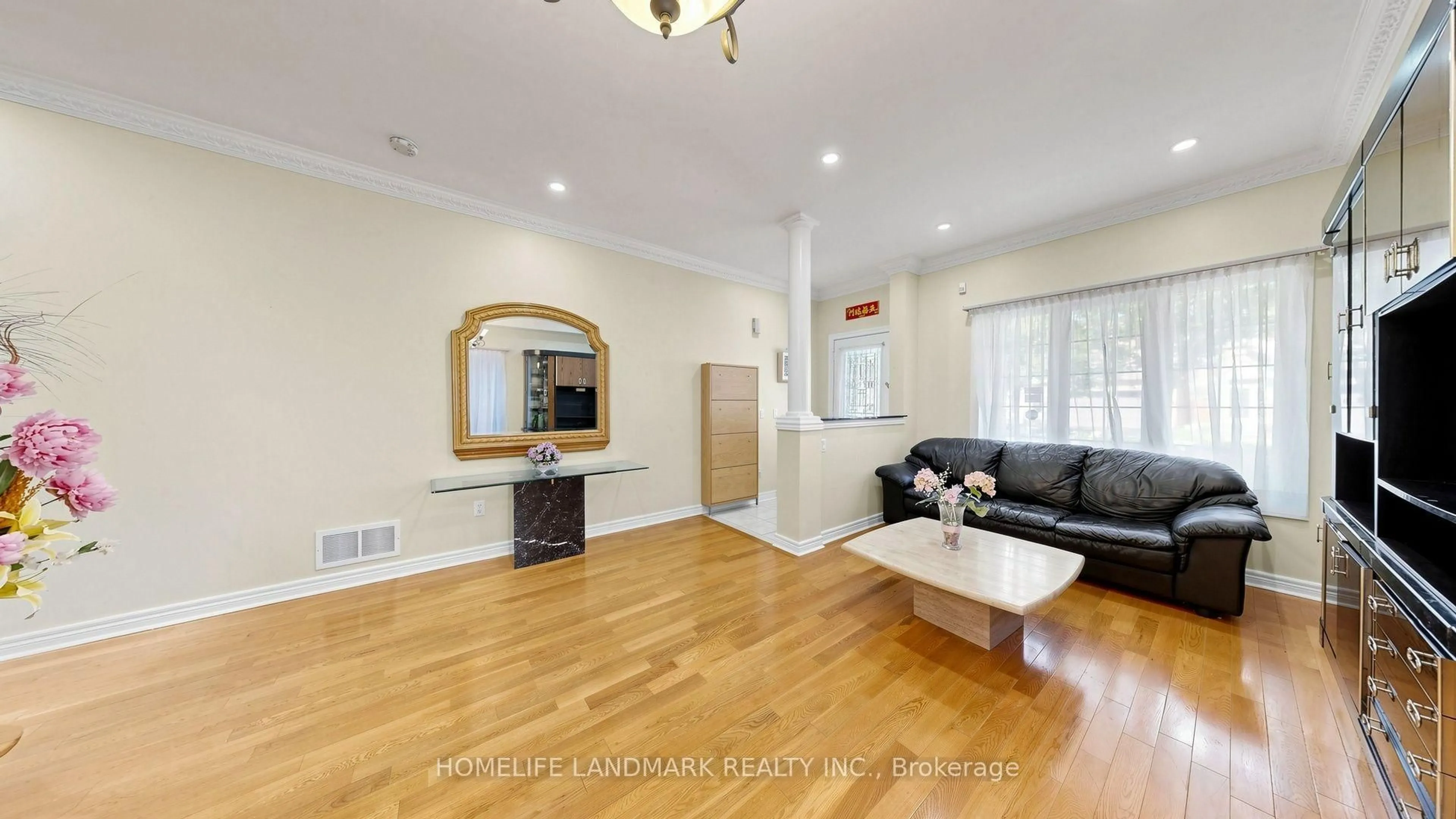 Living room with furniture, wood/laminate floor for 220 Williamson Rd, Markham Ontario L6E 1S2
