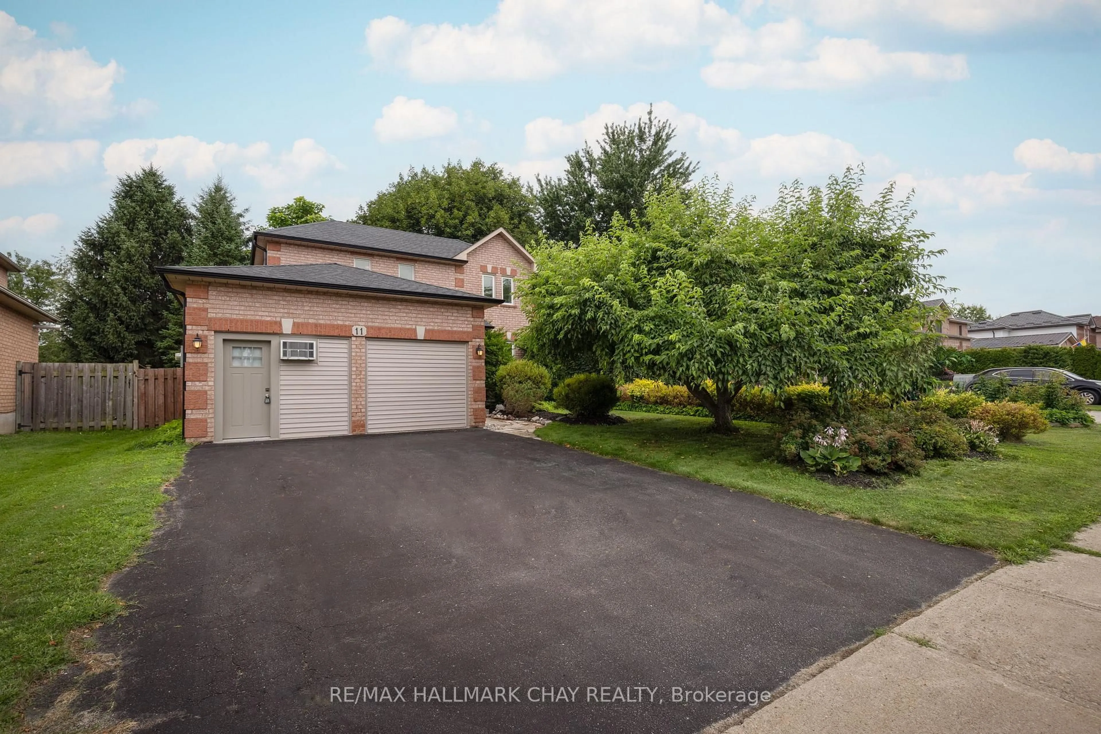 A pic from outside/outdoor area/front of a property/back of a property/a pic from drone, street for 11 Dugdale Ave, New Tecumseth Ontario L0G 1A0