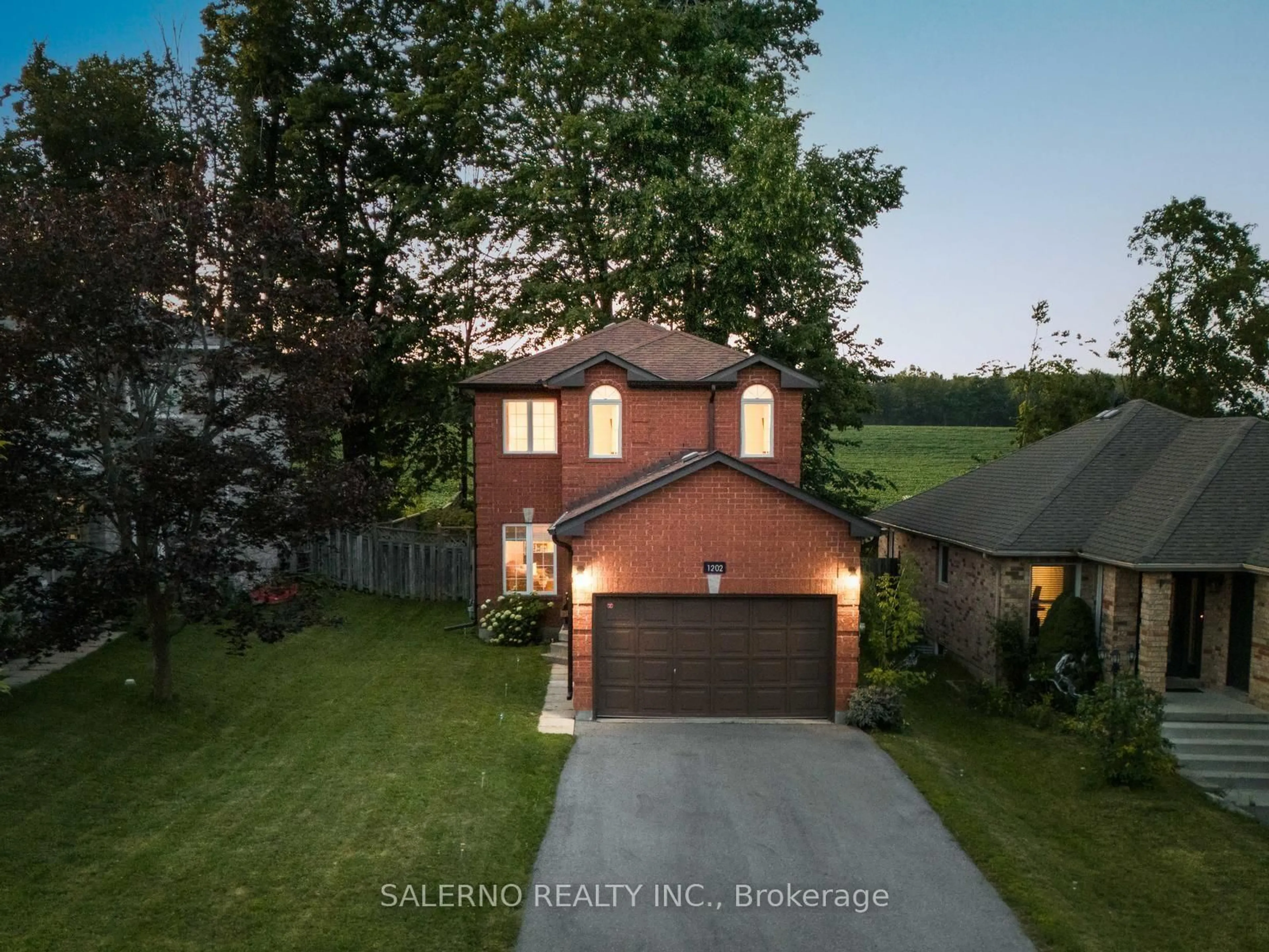A pic from outside/outdoor area/front of a property/back of a property/a pic from drone, street for 1202 Leslie Dr, Innisfil Ontario L9S 2B1