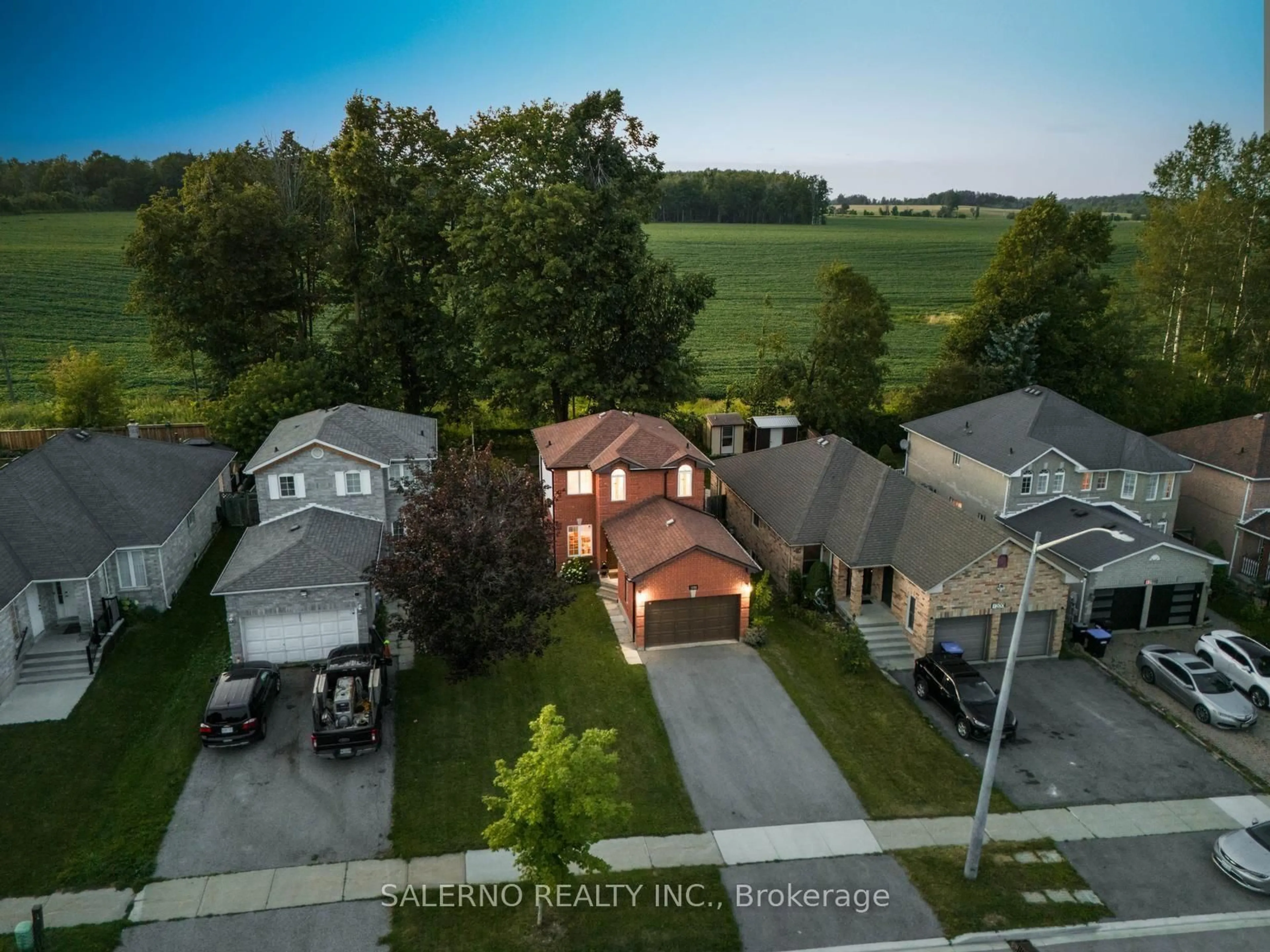 A pic from outside/outdoor area/front of a property/back of a property/a pic from drone, street for 1202 Leslie Dr, Innisfil Ontario L9S 2B1
