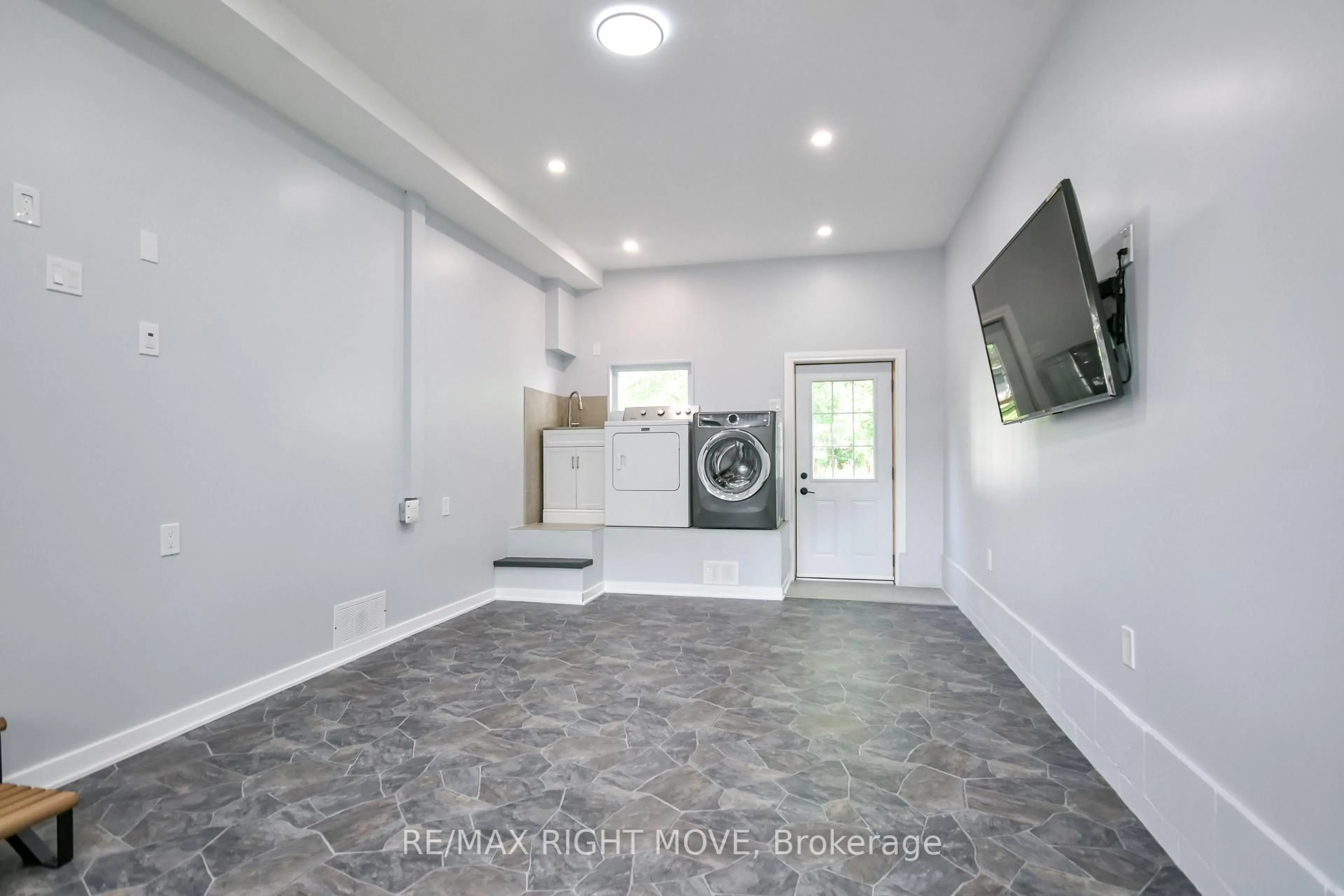 Laundry room for 18 Bushey Ave, Essa Ontario L3W 0L2