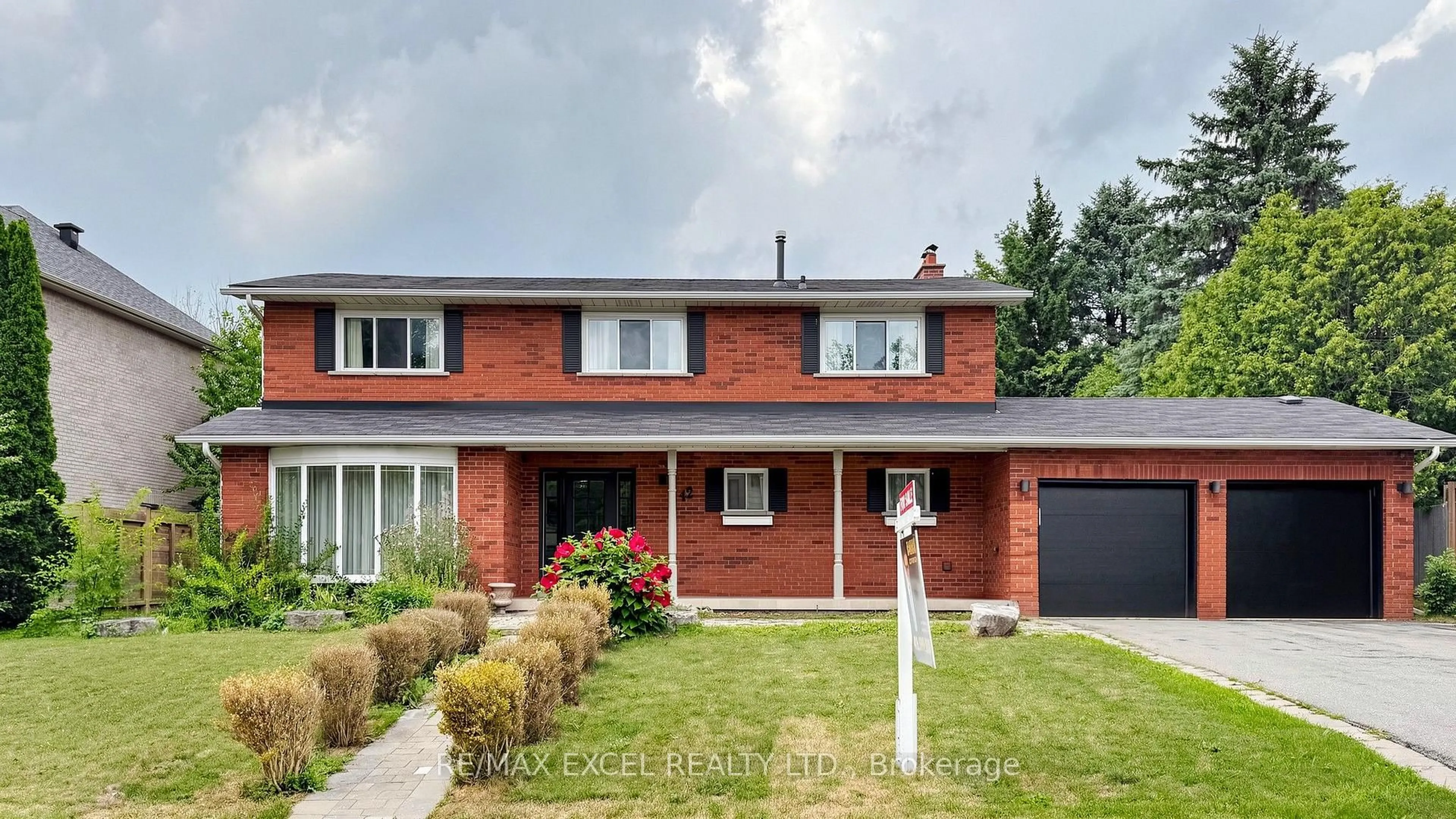 Home with brick exterior material, street for 42 Blackforest Dr, Richmond Hill Ontario L4E 2N6