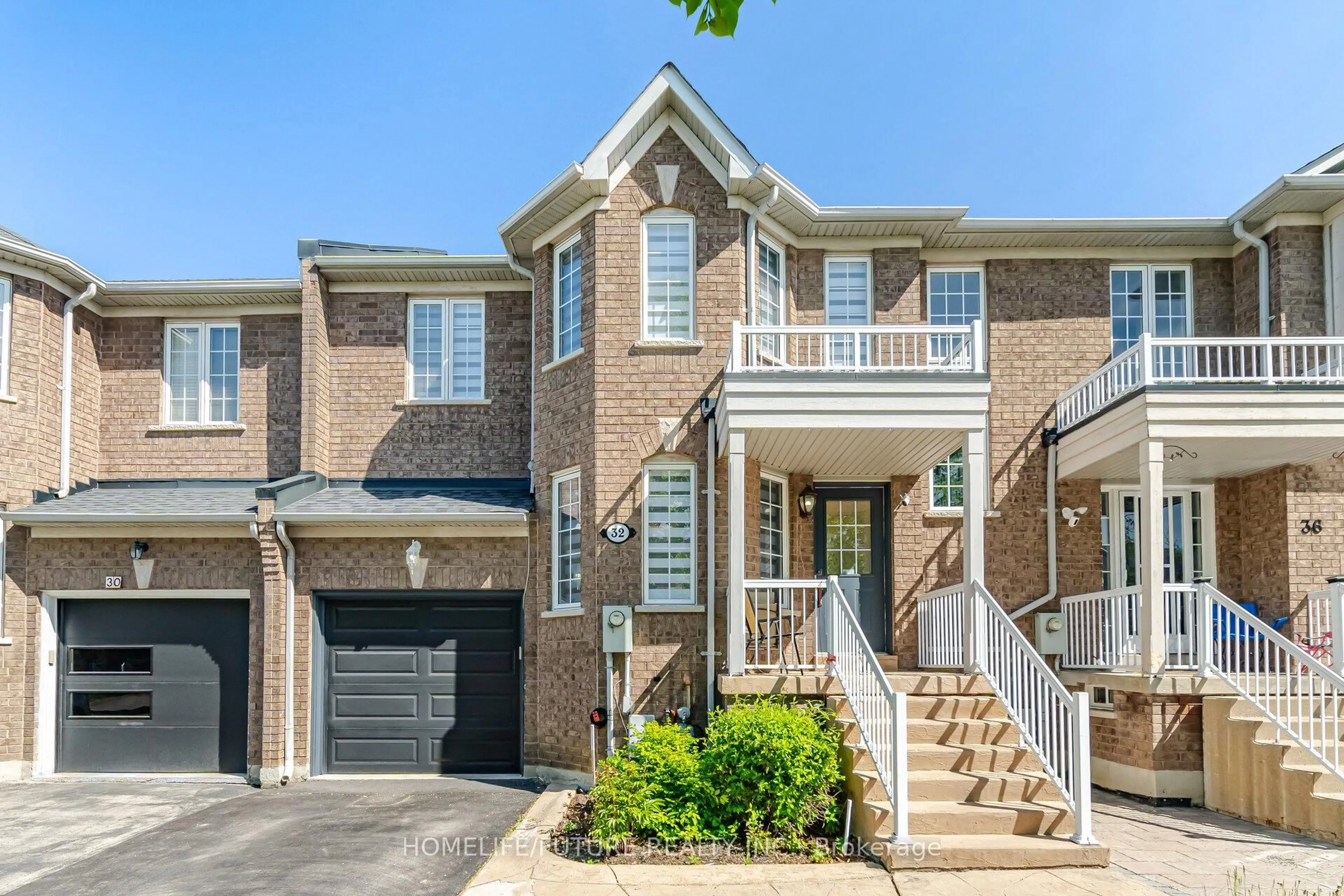 Home with brick exterior material, street for 32 Laurelhurst Cres, Vaughan Ontario L4H 2M8