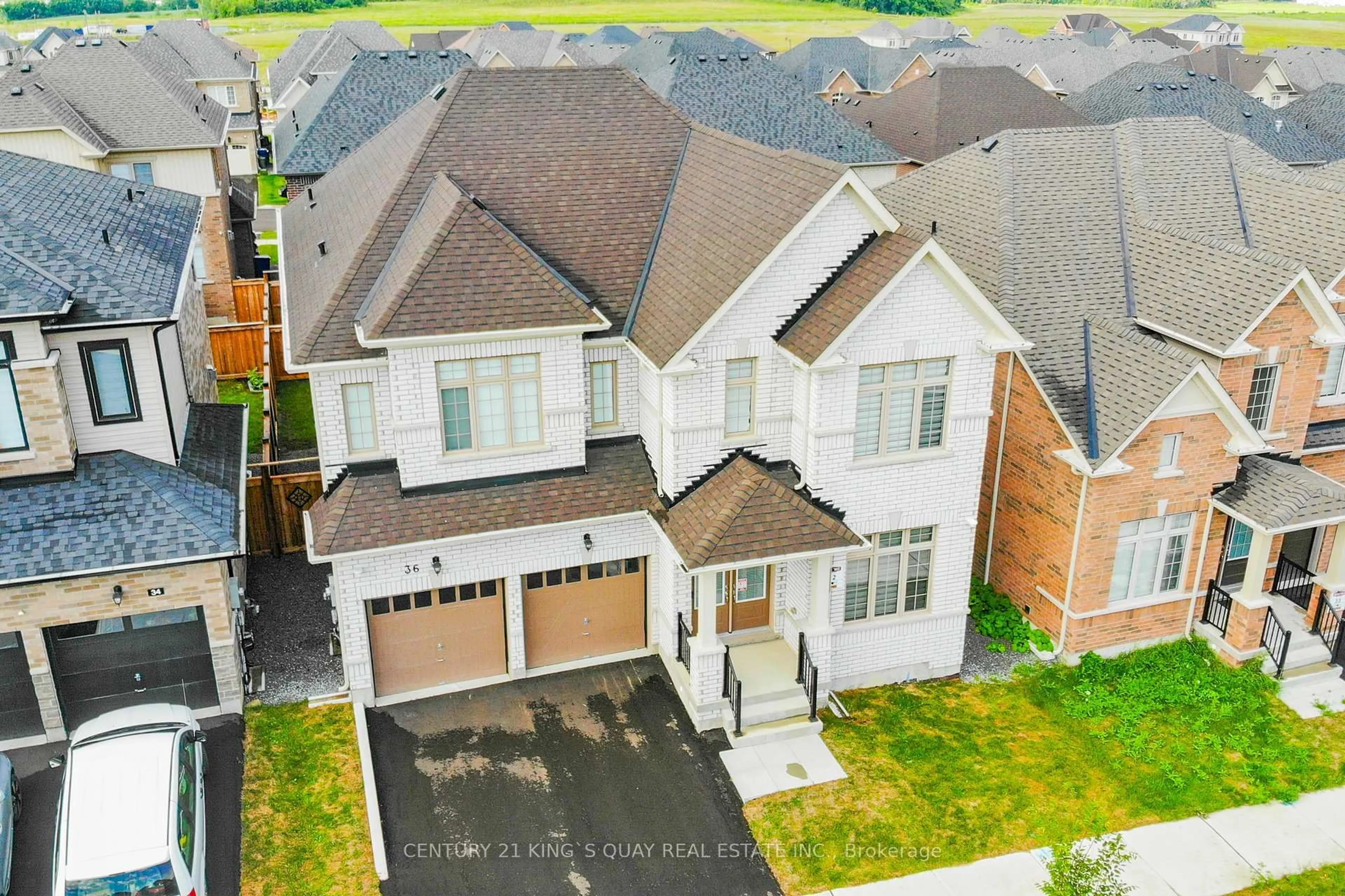 A pic from outside/outdoor area/front of a property/back of a property/a pic from drone, street for 36 Bostock Dr, Georgina Ontario L4P 0S5
