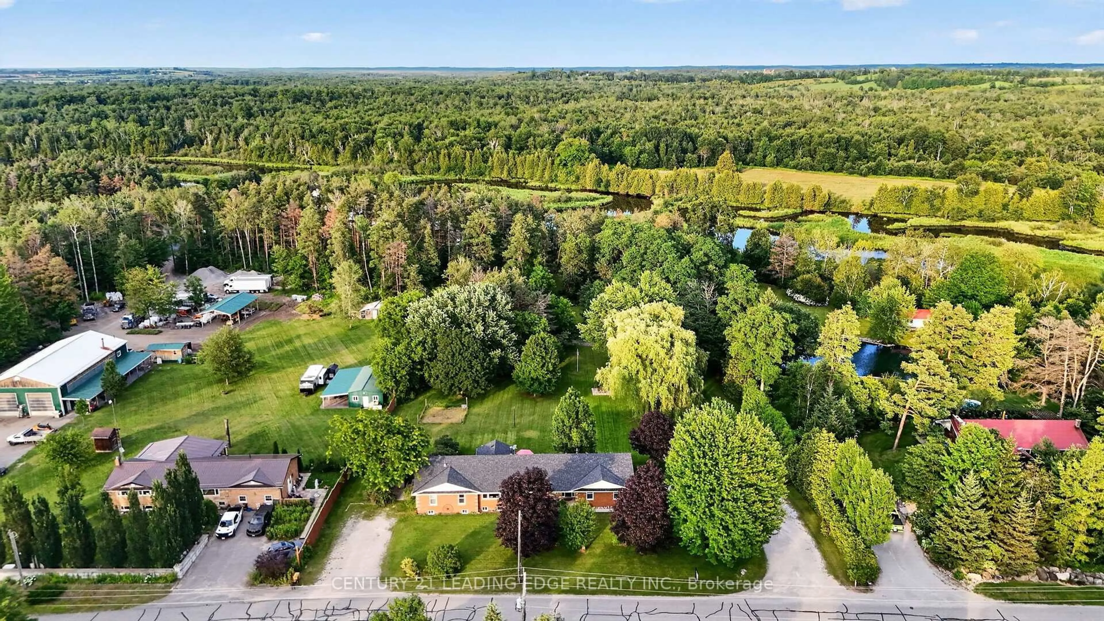 A pic from outside/outdoor area/front of a property/back of a property/a pic from drone, forest/trees view for 23233 Miles Rd, Georgina Ontario L0E 1R0