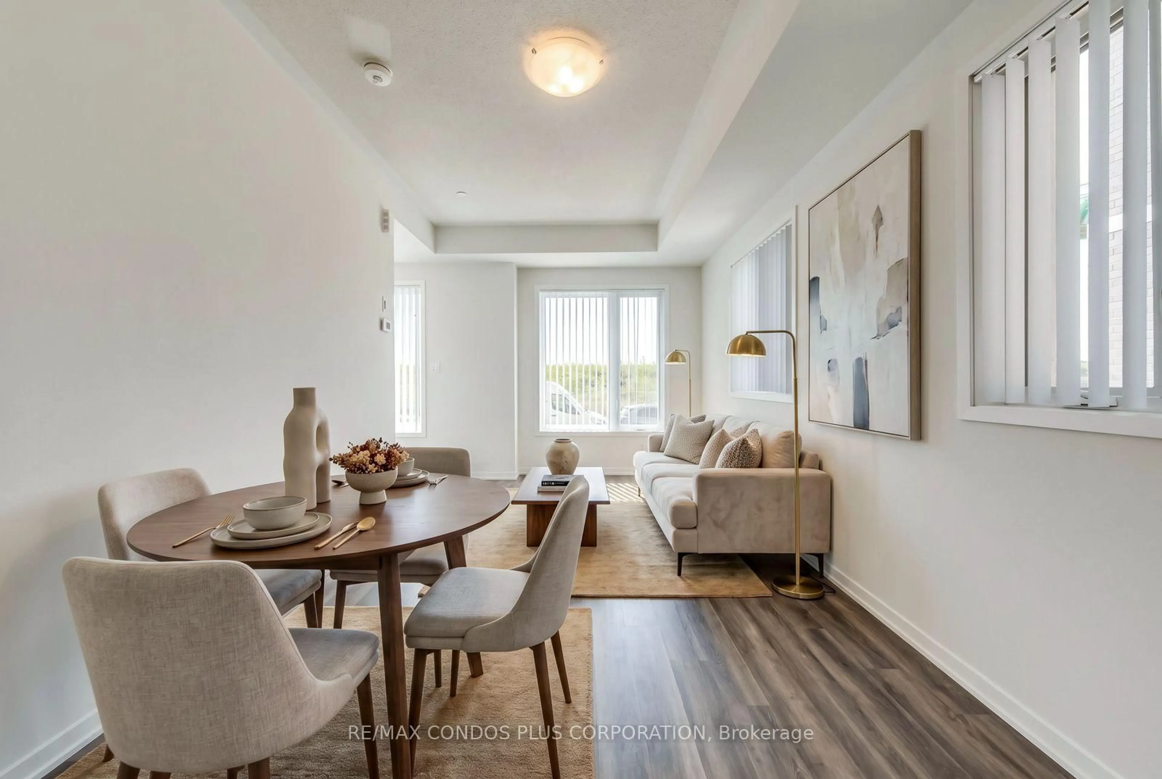 Living room with furniture, wood/laminate floor for 140 Honeycrisp Cres #281, Vaughan Ontario L4K 0N7