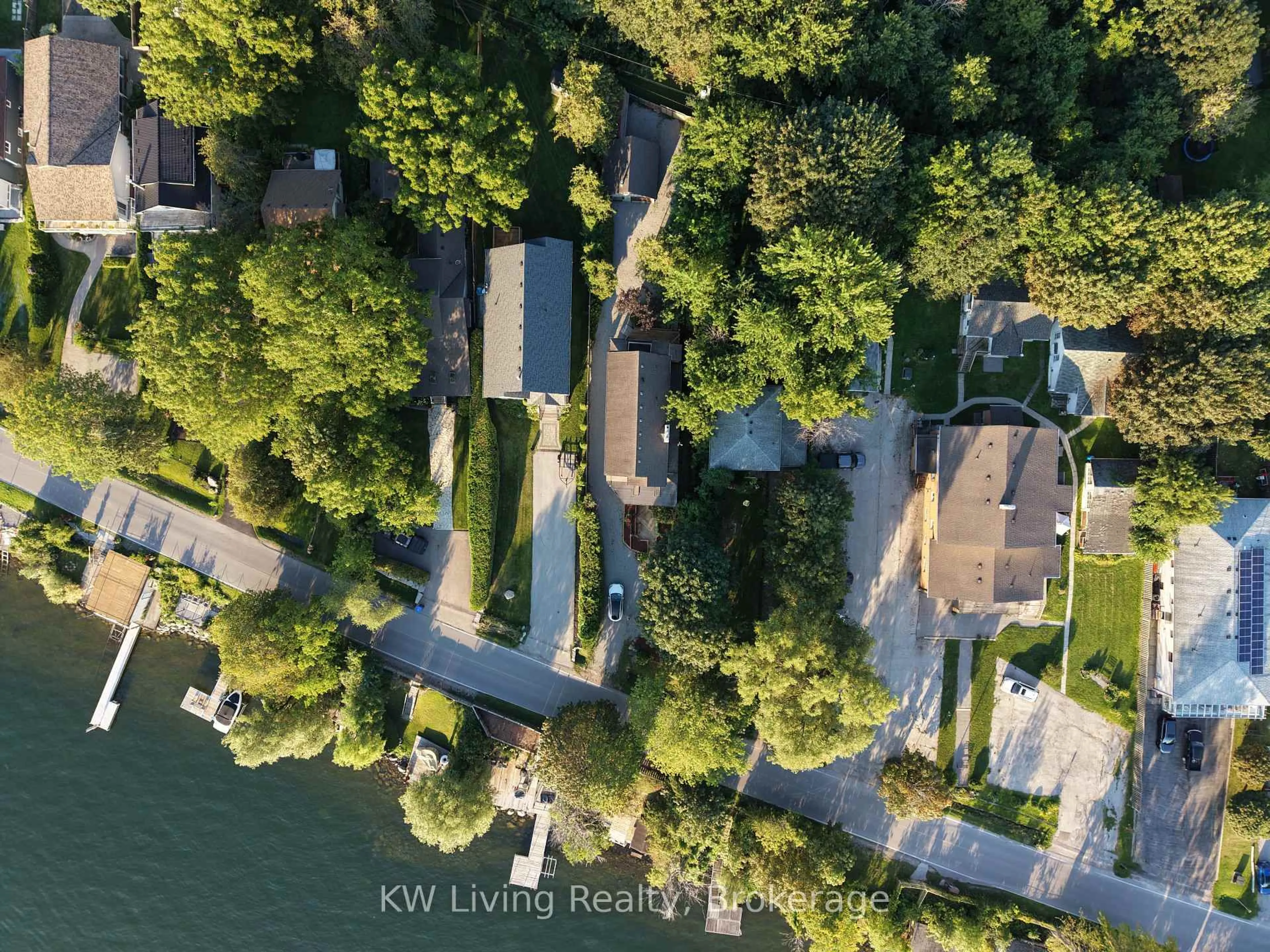 A pic from outside/outdoor area/front of a property/back of a property/a pic from drone, water/lake/river/ocean view for 127 Lake Dr, Georgina Ontario L4P 3C8