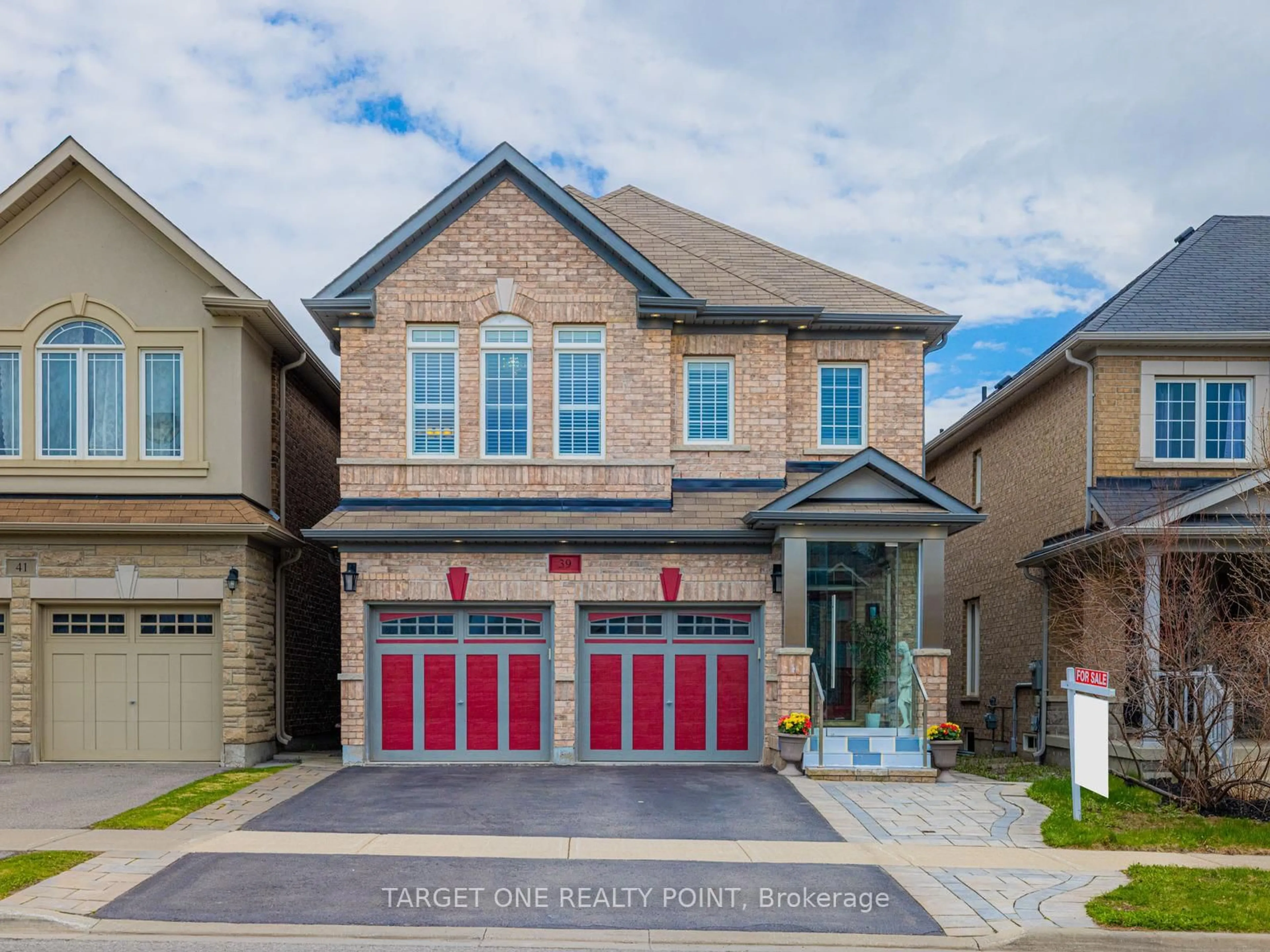 Home with brick exterior material, street for 39 Riding Mountain Dr, Richmond Hill Ontario L4E 0V4