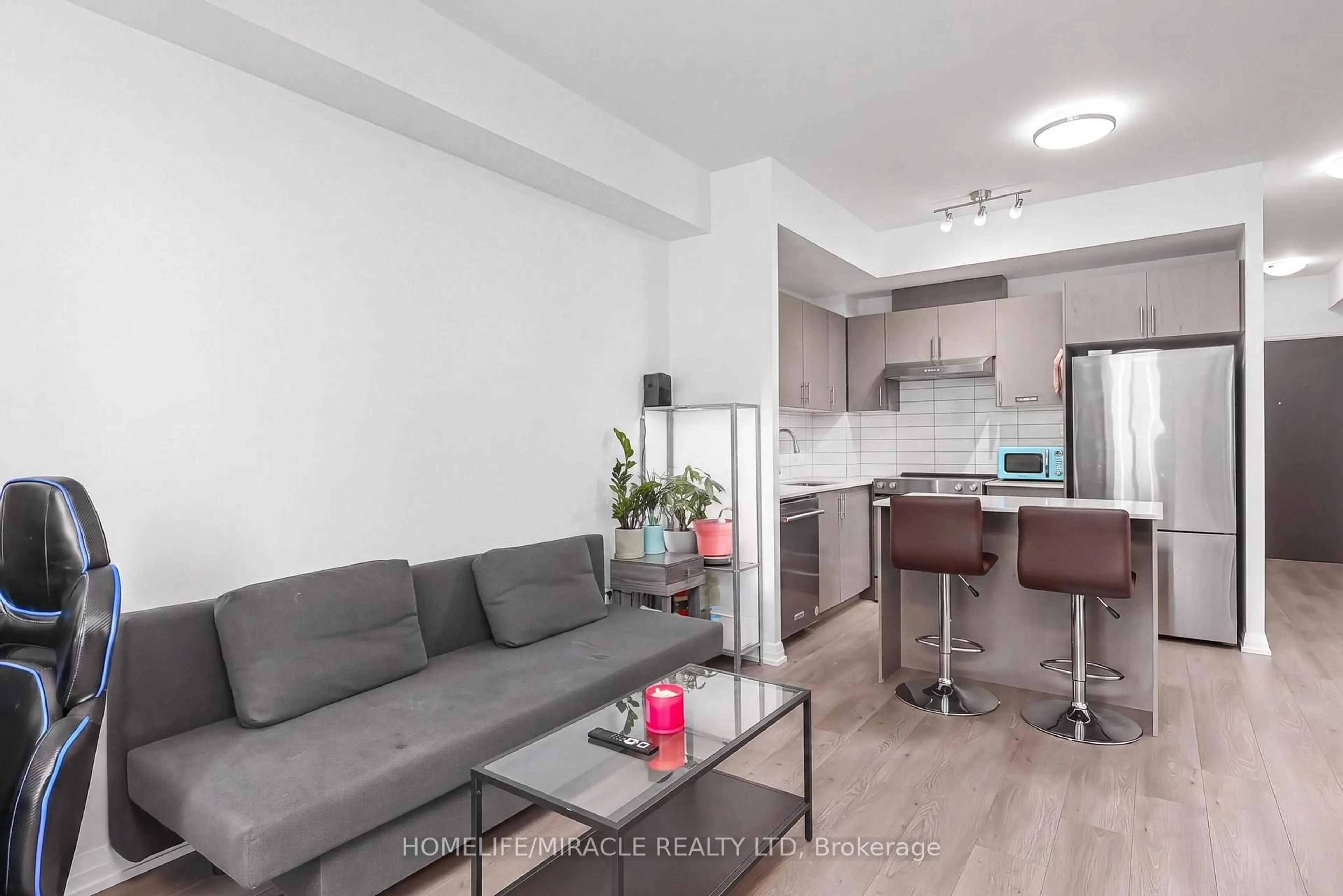 Living room with furniture, unknown for 9000 Jane St #223, Vaughan Ontario L4K 0M6