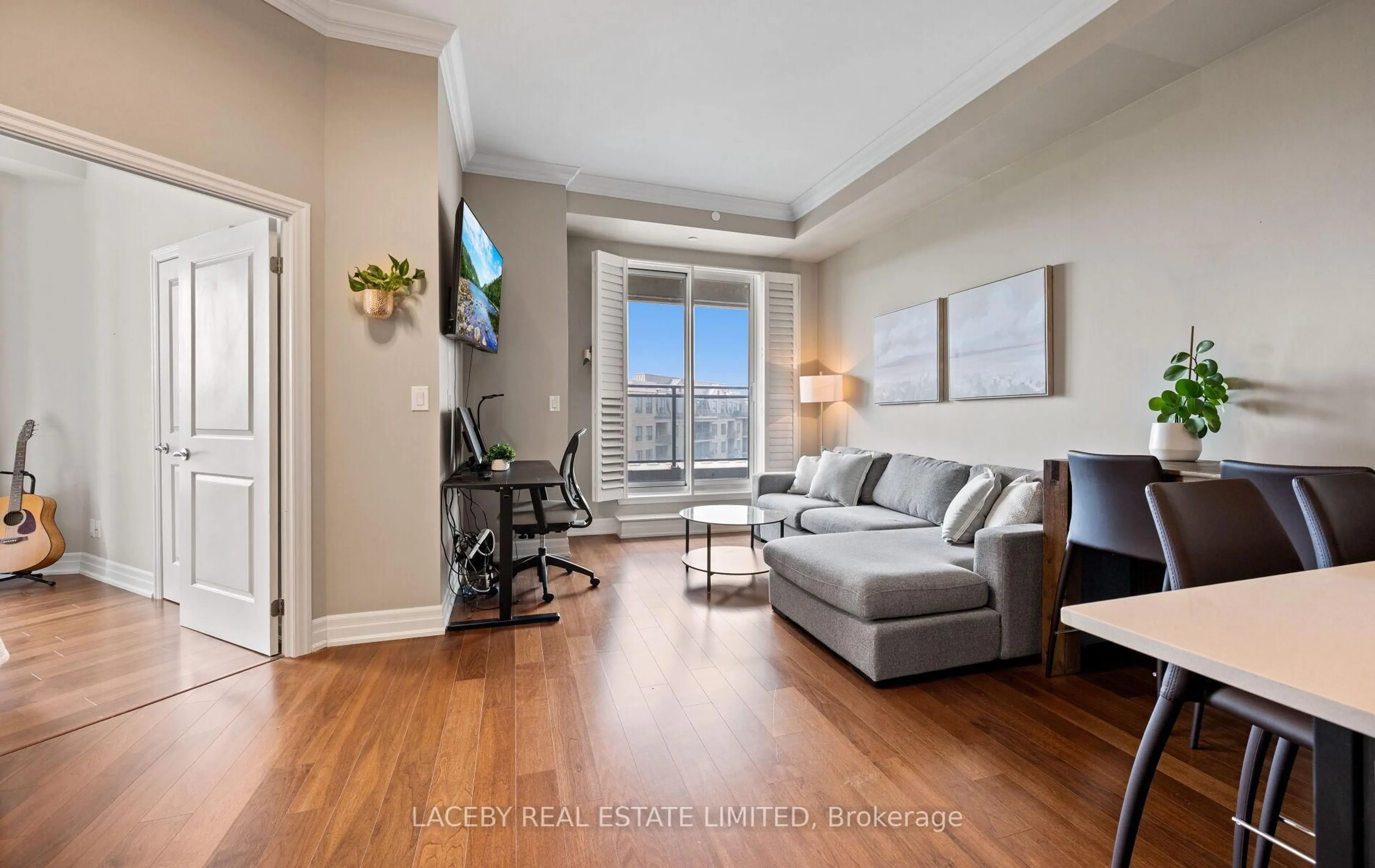 Living room with furniture, wood/laminate floor for 111 Civic Square Gate #507, Aurora Ontario L4G 0S6