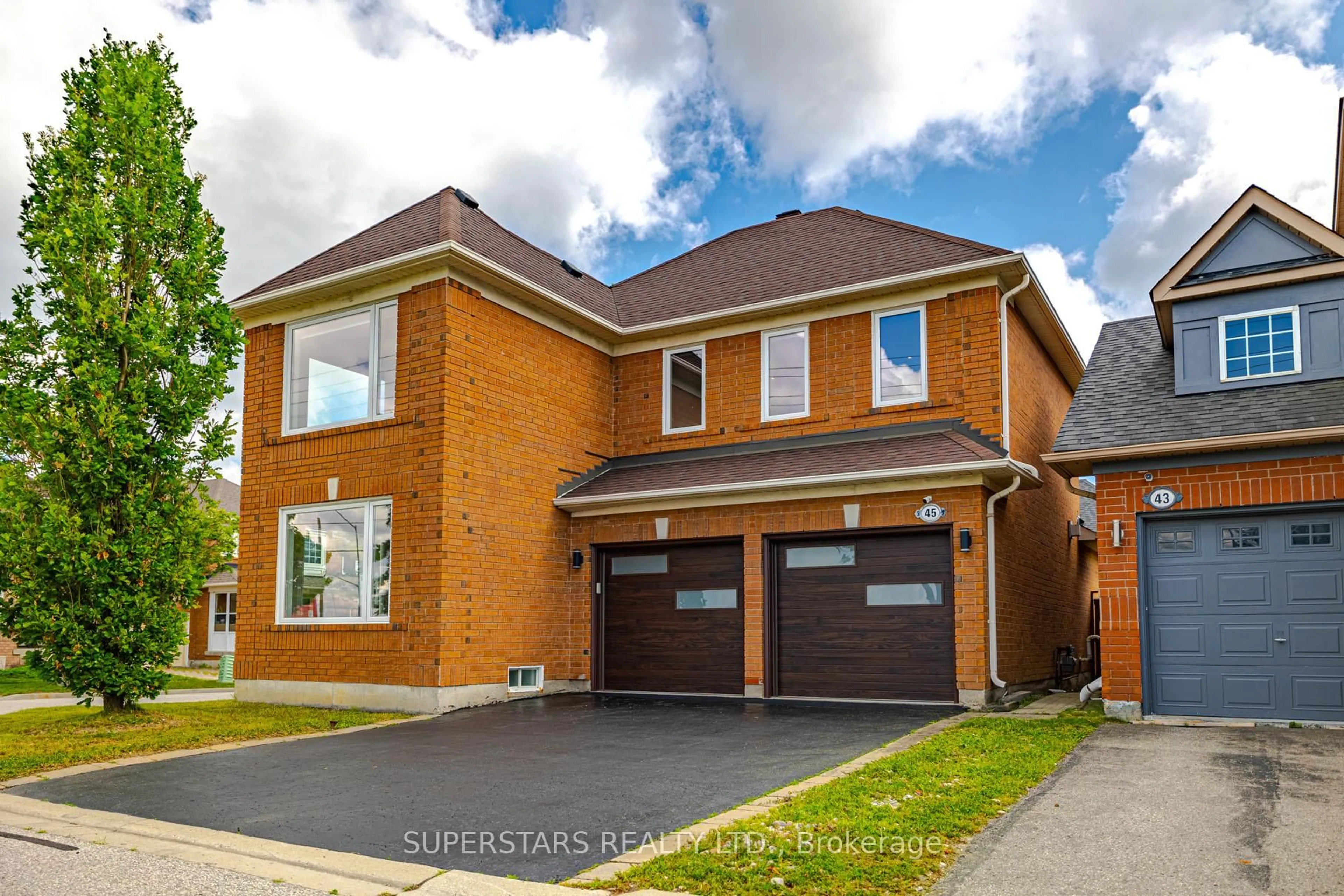 Home with brick exterior material, street for 45 Tower Bridge Cres, Markham Ontario L6C 2M9