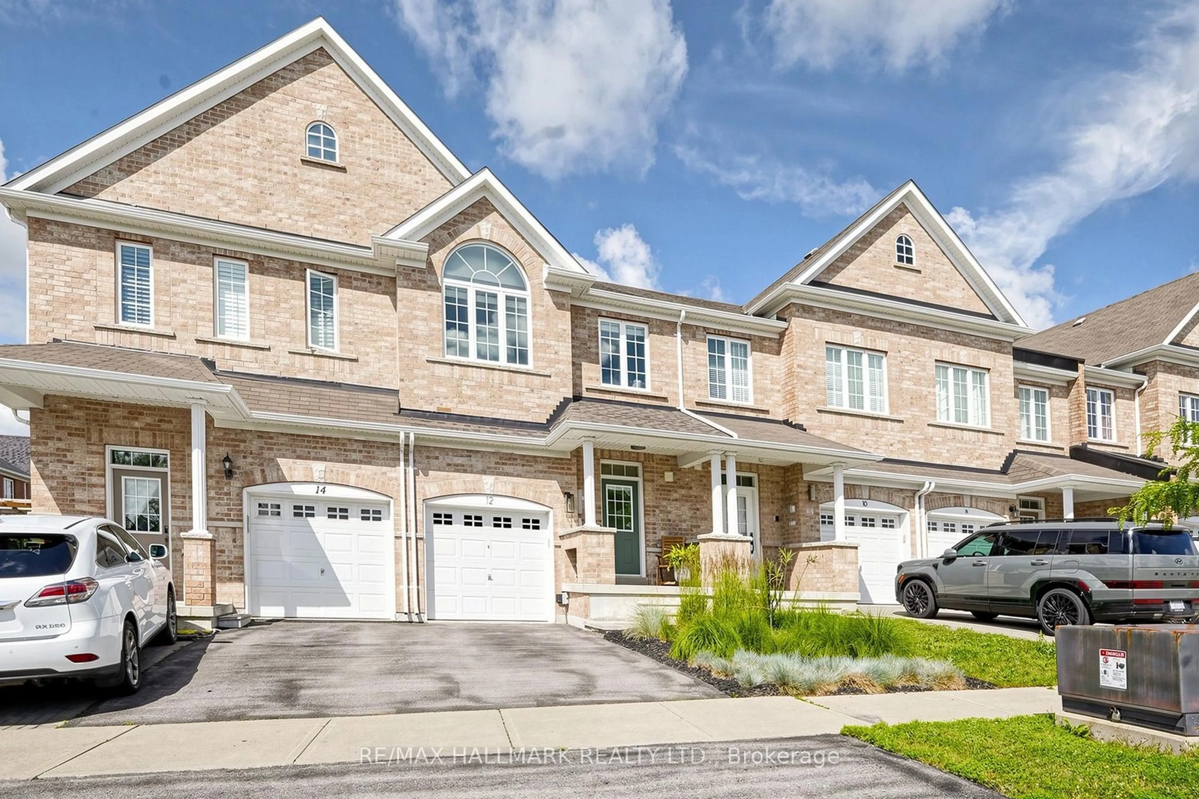 Home with brick exterior material, street for 12 Danpatrick Dr, Richmond Hill Ontario L4S 2T1