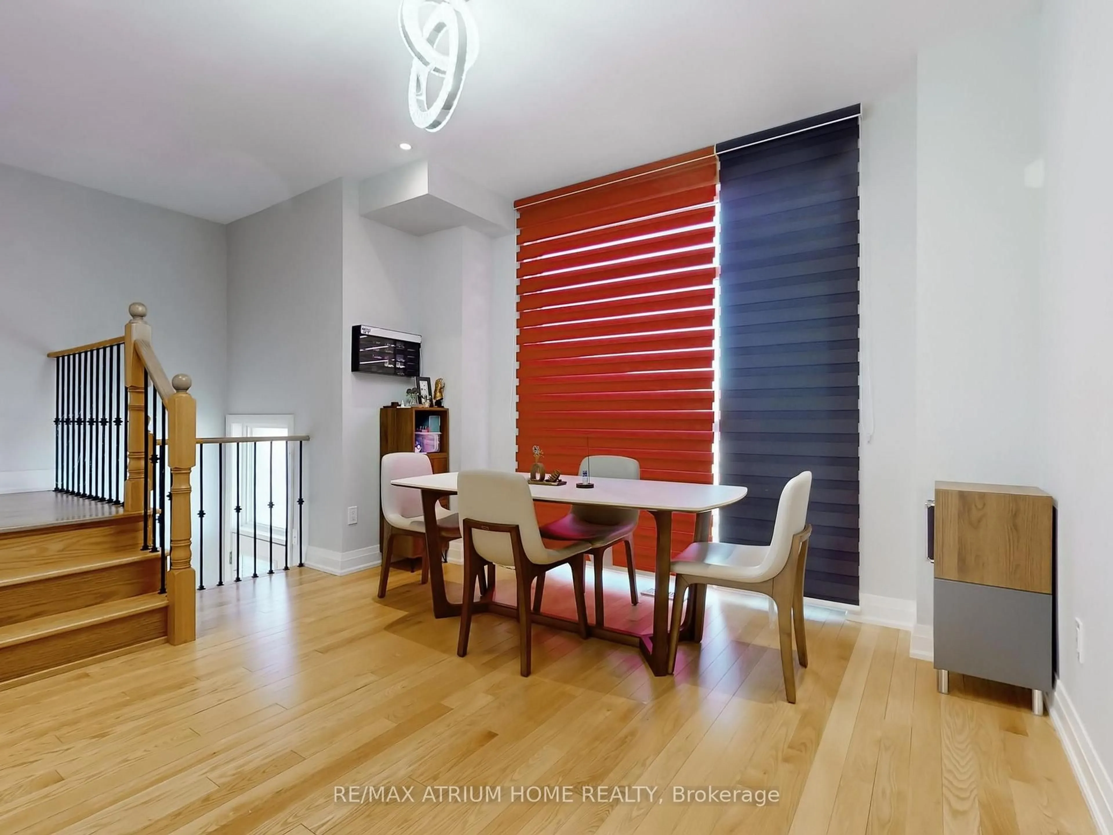 Dining room, wood/laminate floor for 18 Teasel Way, Markham Ontario L3R 1L3