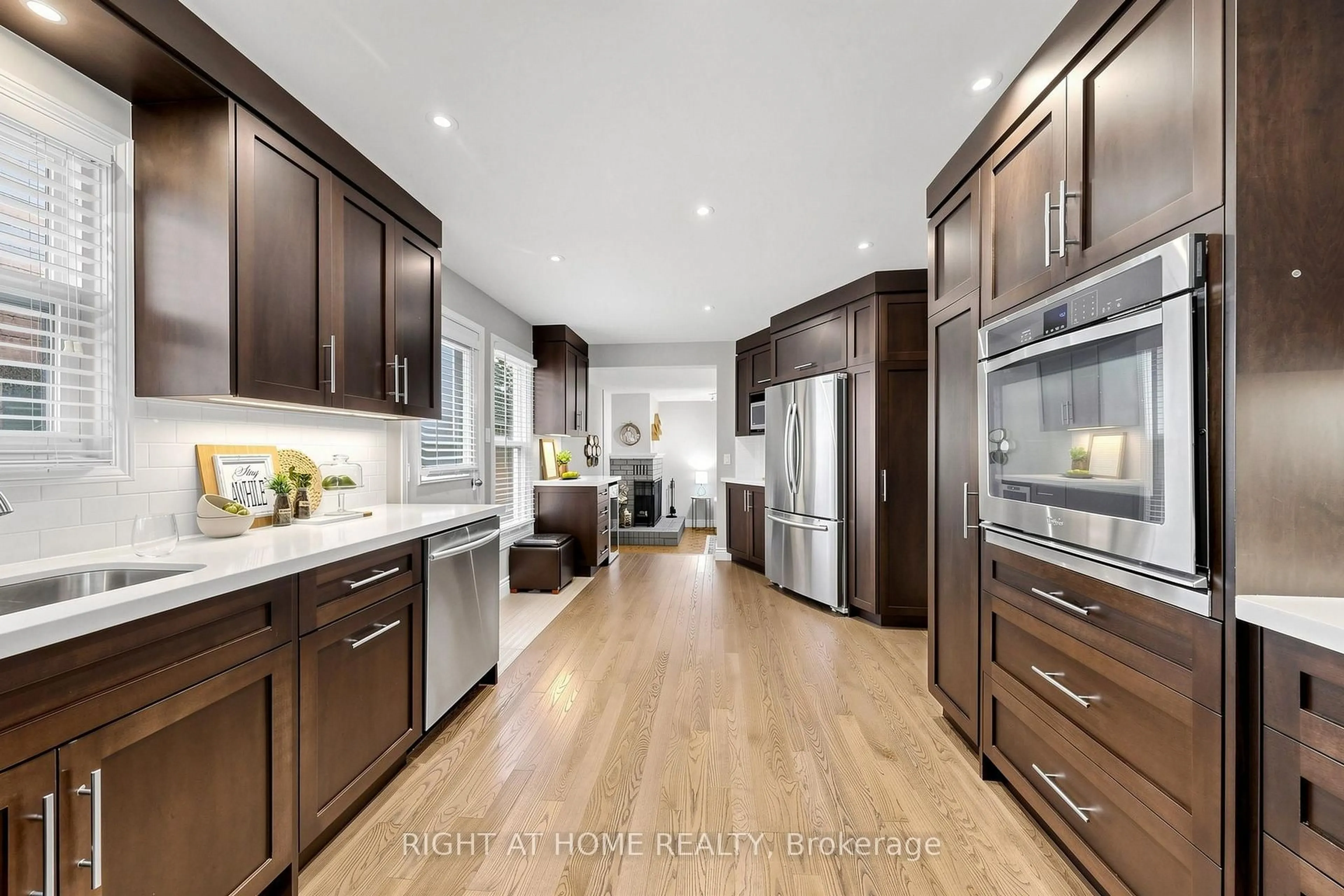 Open concept kitchen, wood/laminate floor for 16 Rosemead Clse, Markham Ontario L3R 3Z3