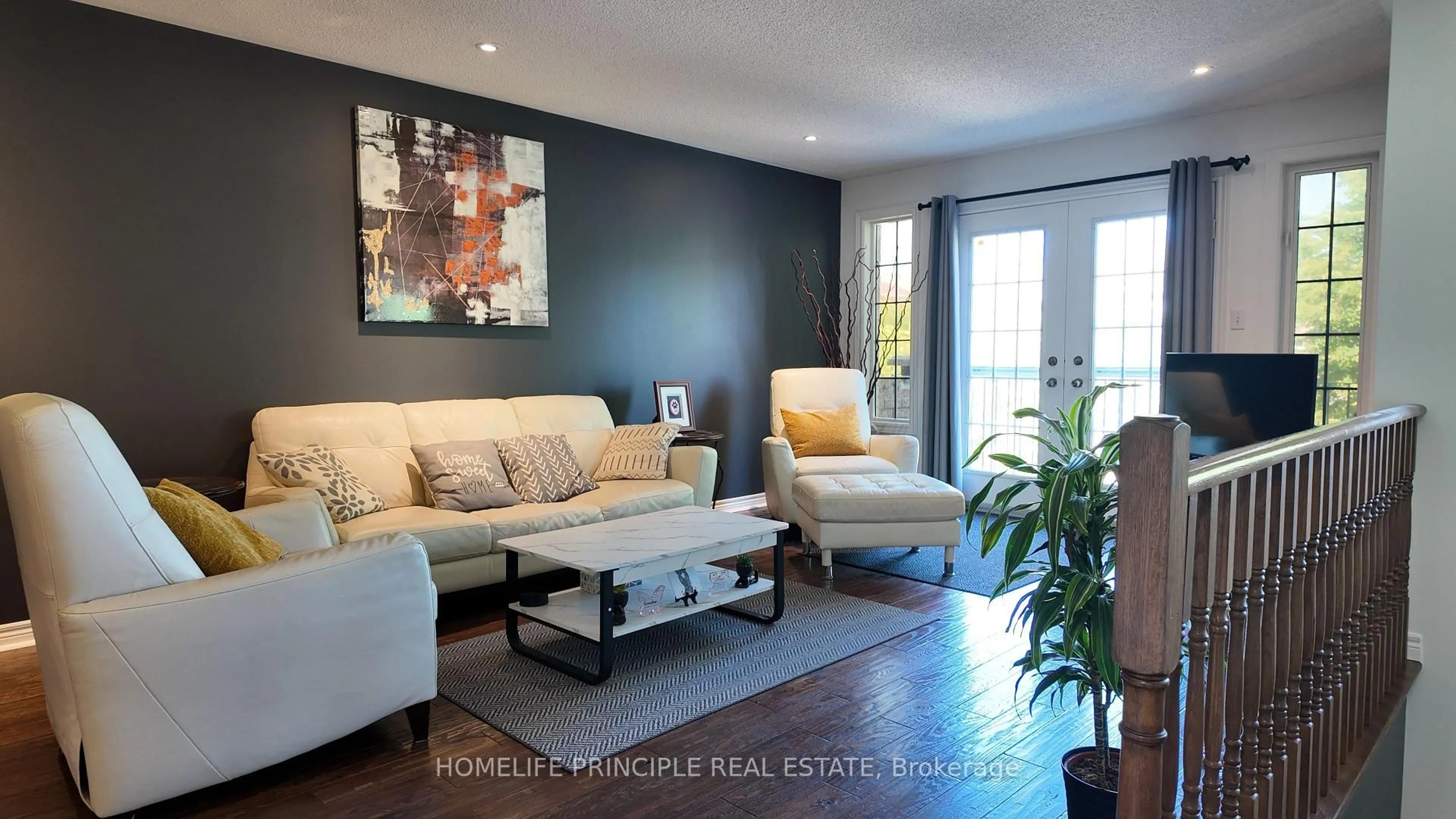 Living room with furniture, wood/laminate floor for 18 D'Amato Cres, Vaughan Ontario L6A 3E6
