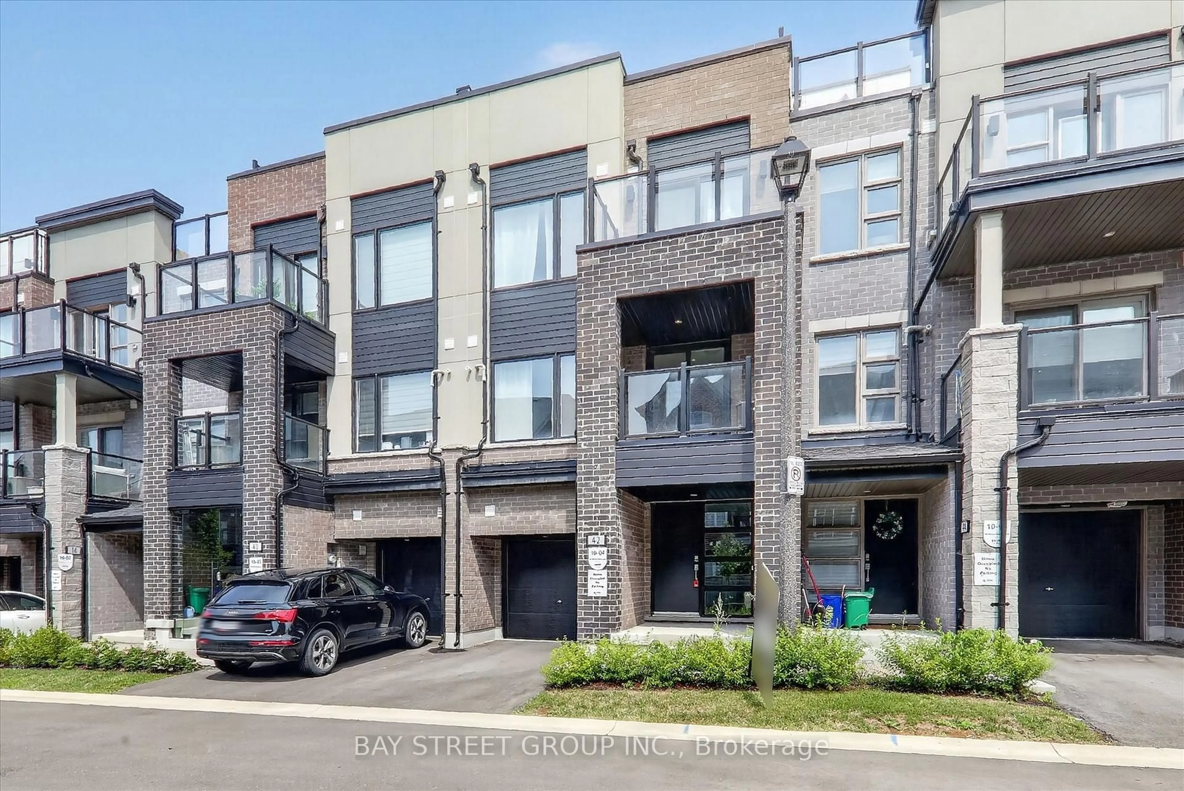 Home with brick exterior material, street for 42 HERMAN GILROY Lane, Markham Ontario L6C 3L7