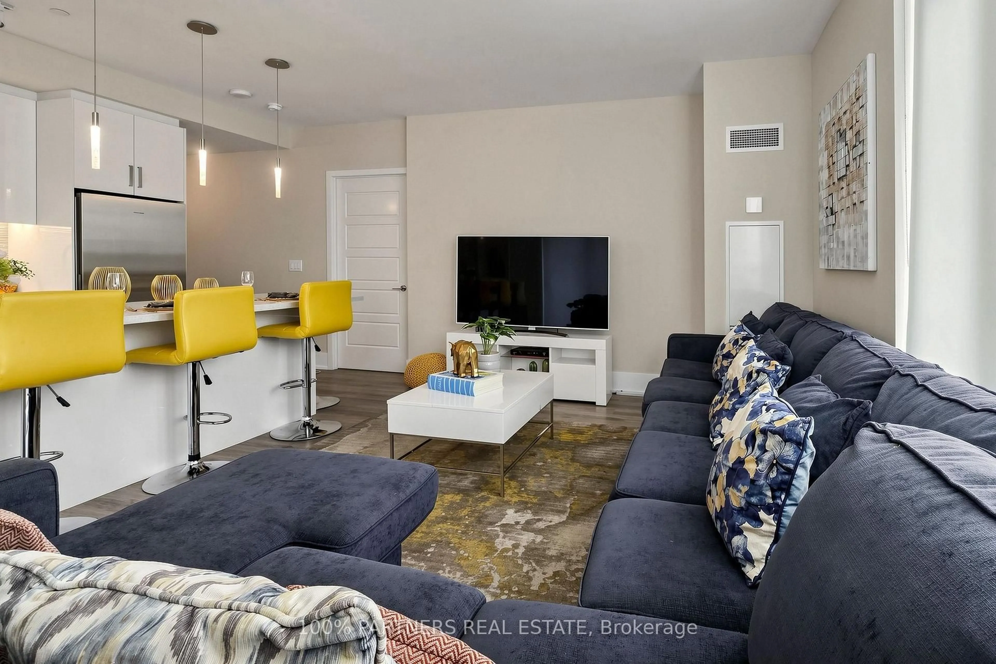 Living room with furniture, unknown for 241 Sea Ray Ave #A106, Innisfil Ontario L9S 0L9