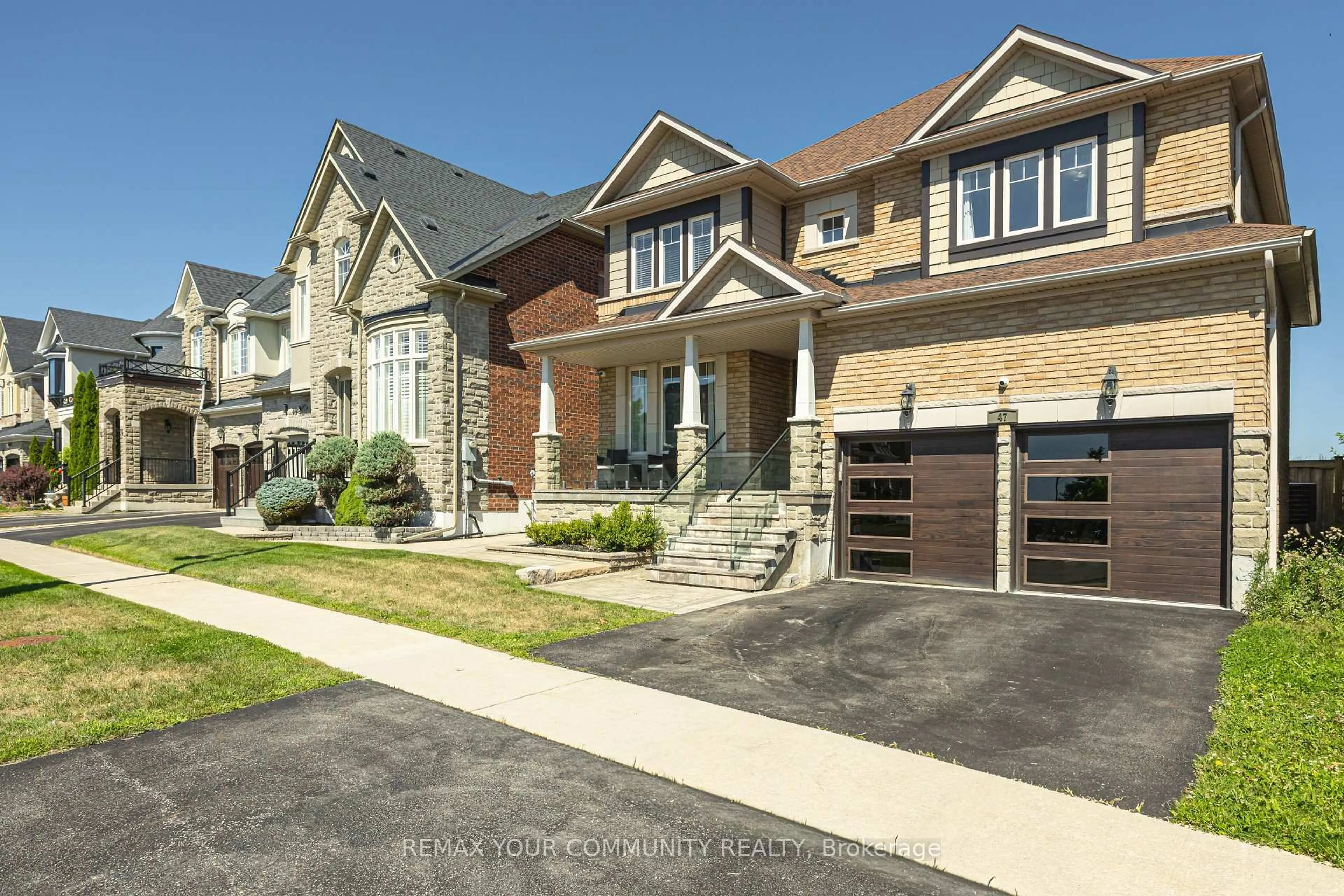 Home with brick exterior material, street for 47 Vandervoort Dr, Richmond Hill Ontario L4E 0C7