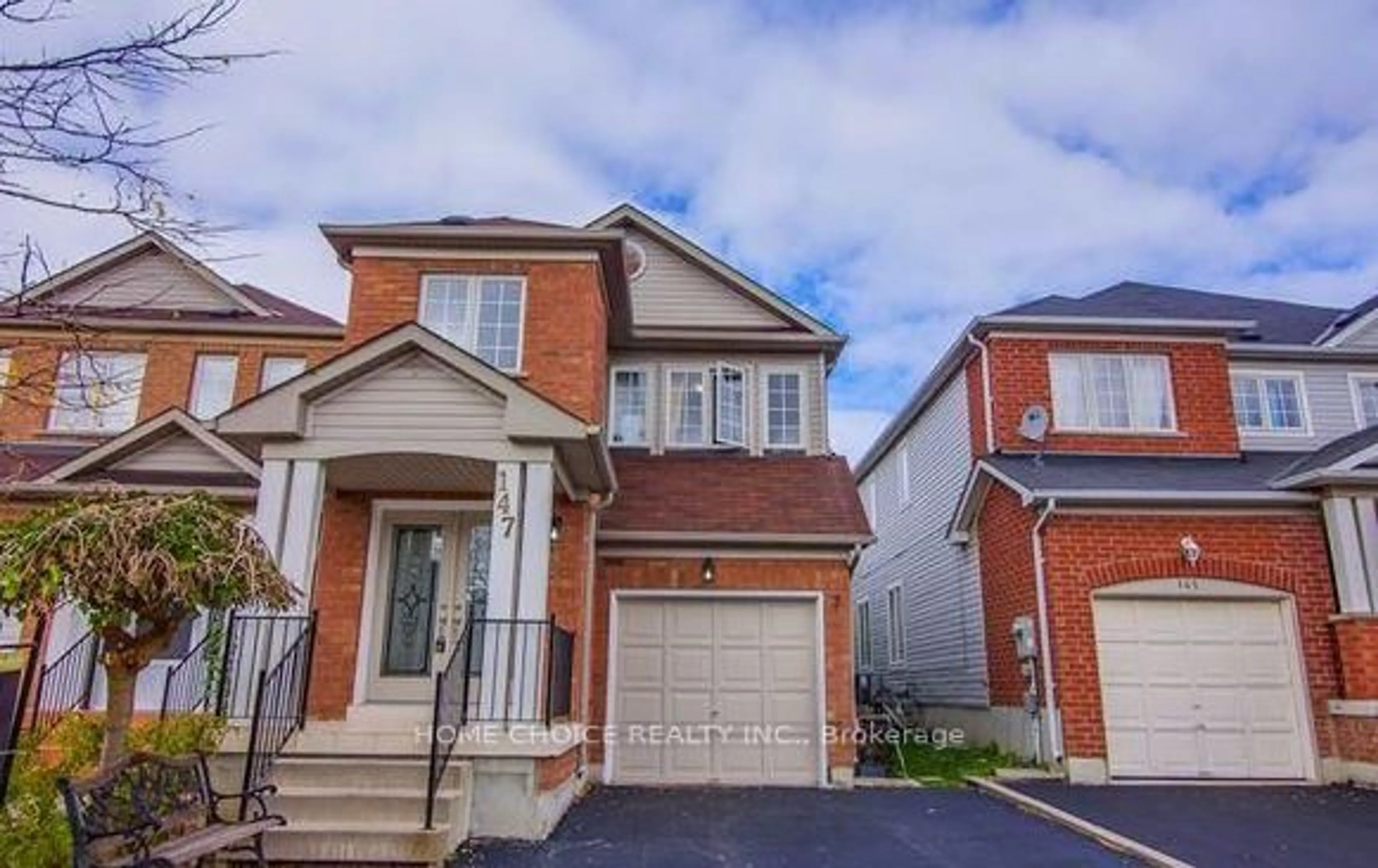 Home with brick exterior material, street for 147 Ferncliffe Cres, Markham Ontario L3S 4N8
