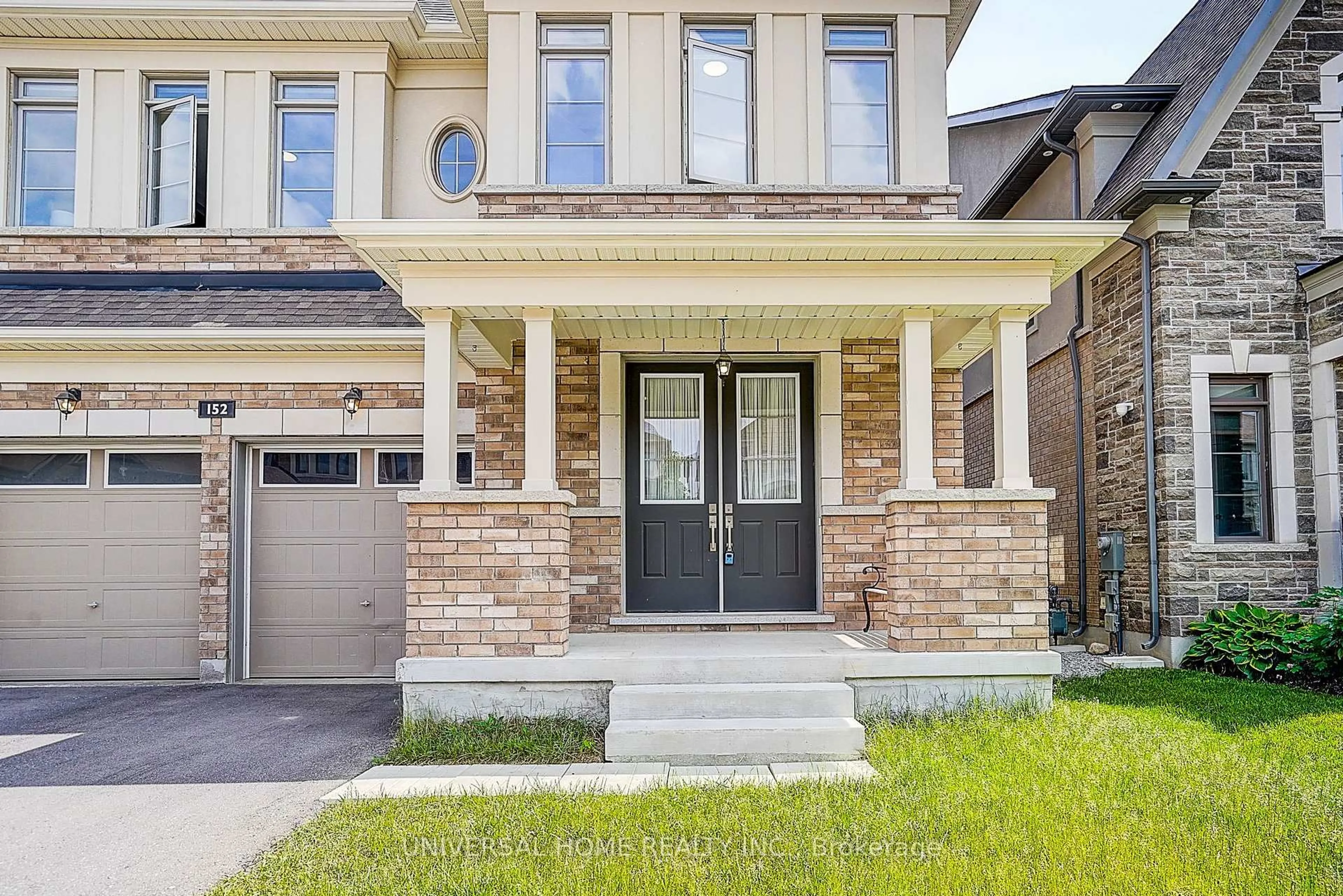 Home with brick exterior material, street for 152 Sikura Circ, Aurora Ontario L4G 3Z1
