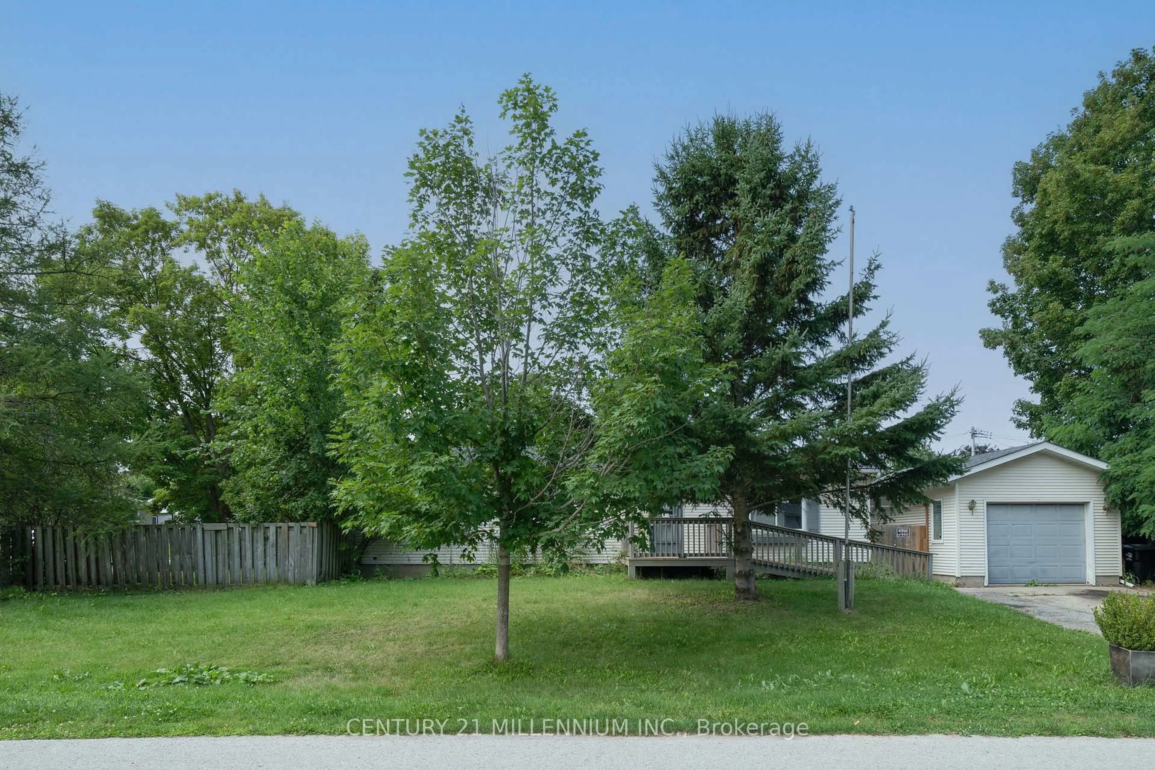 A pic from outside/outdoor area/front of a property/back of a property/a pic from drone, forest/trees view for 60 Eastern Ave, New Tecumseth Ontario L0G 1W0