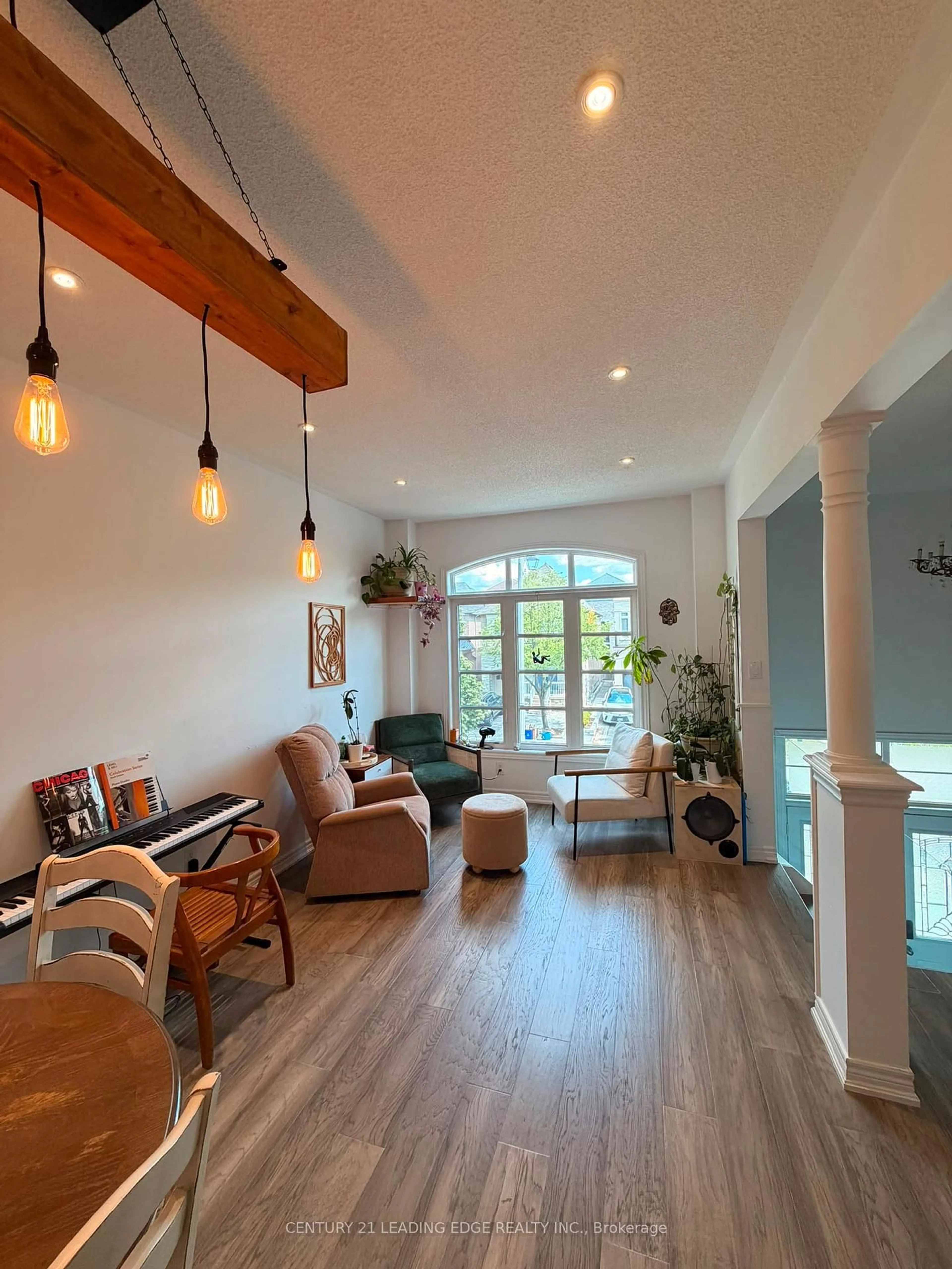 Living room with furniture, wood/laminate floor for 28 Asner Ave, Vaughan Ontario L6A 0W6