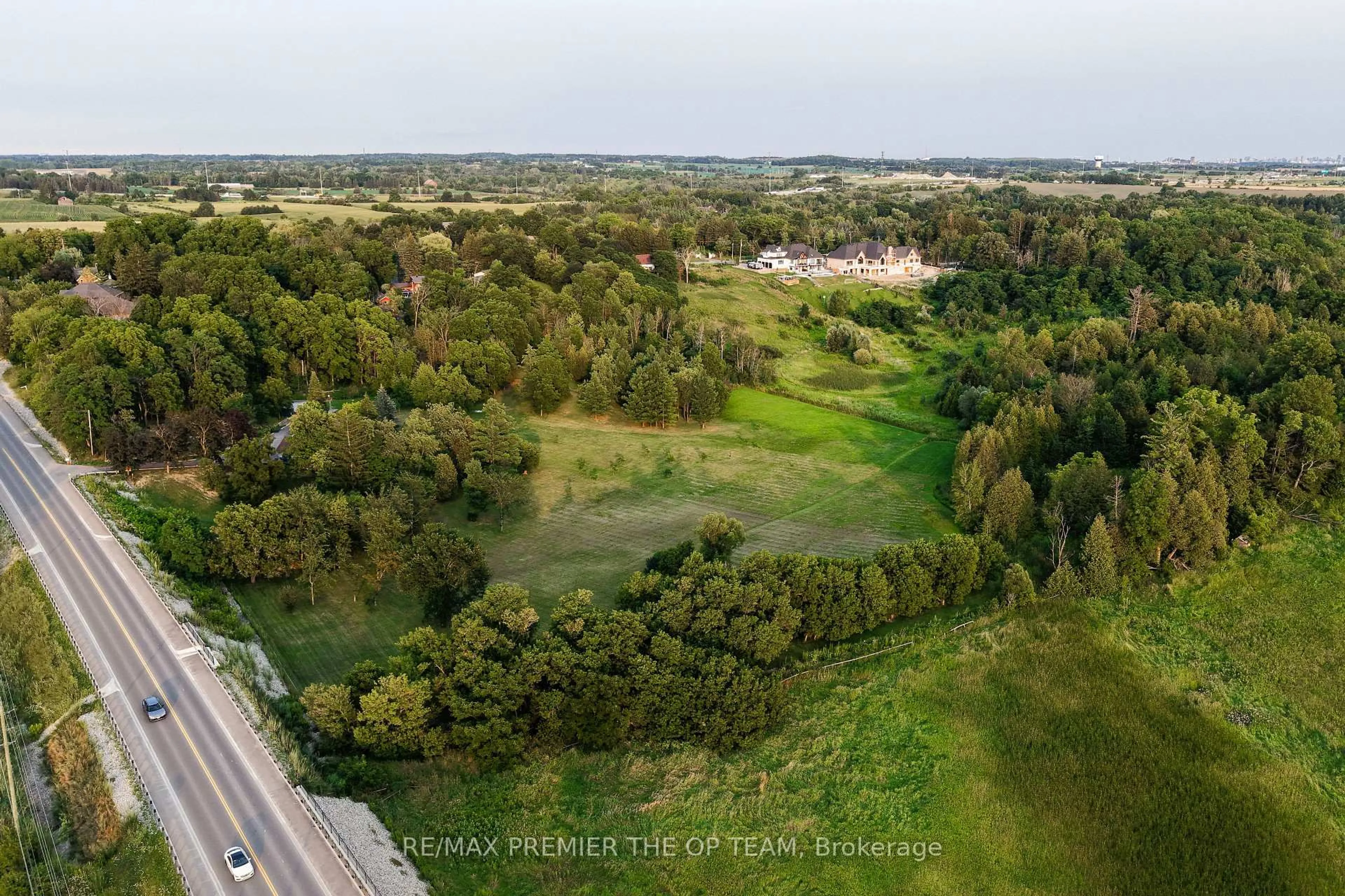 A pic from outside/outdoor area/front of a property/back of a property/a pic from drone, forest/trees view for 3815 King Rd, King Ontario L7B 1K4