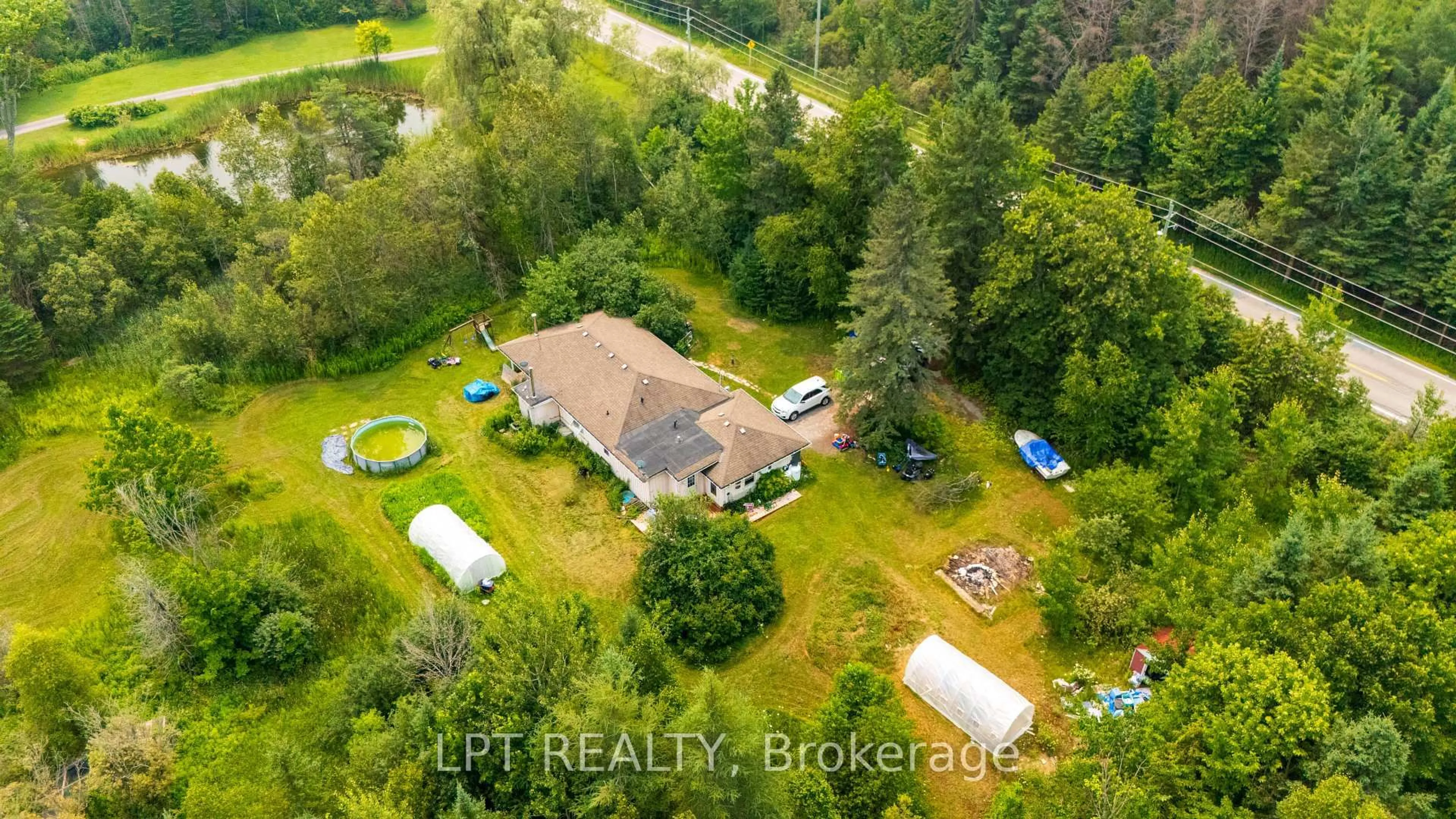 A pic from outside/outdoor area/front of a property/back of a property/a pic from drone, water/lake/river/ocean view for 23983 Weirs Sdrd, Georgina Ontario L0E 1N0