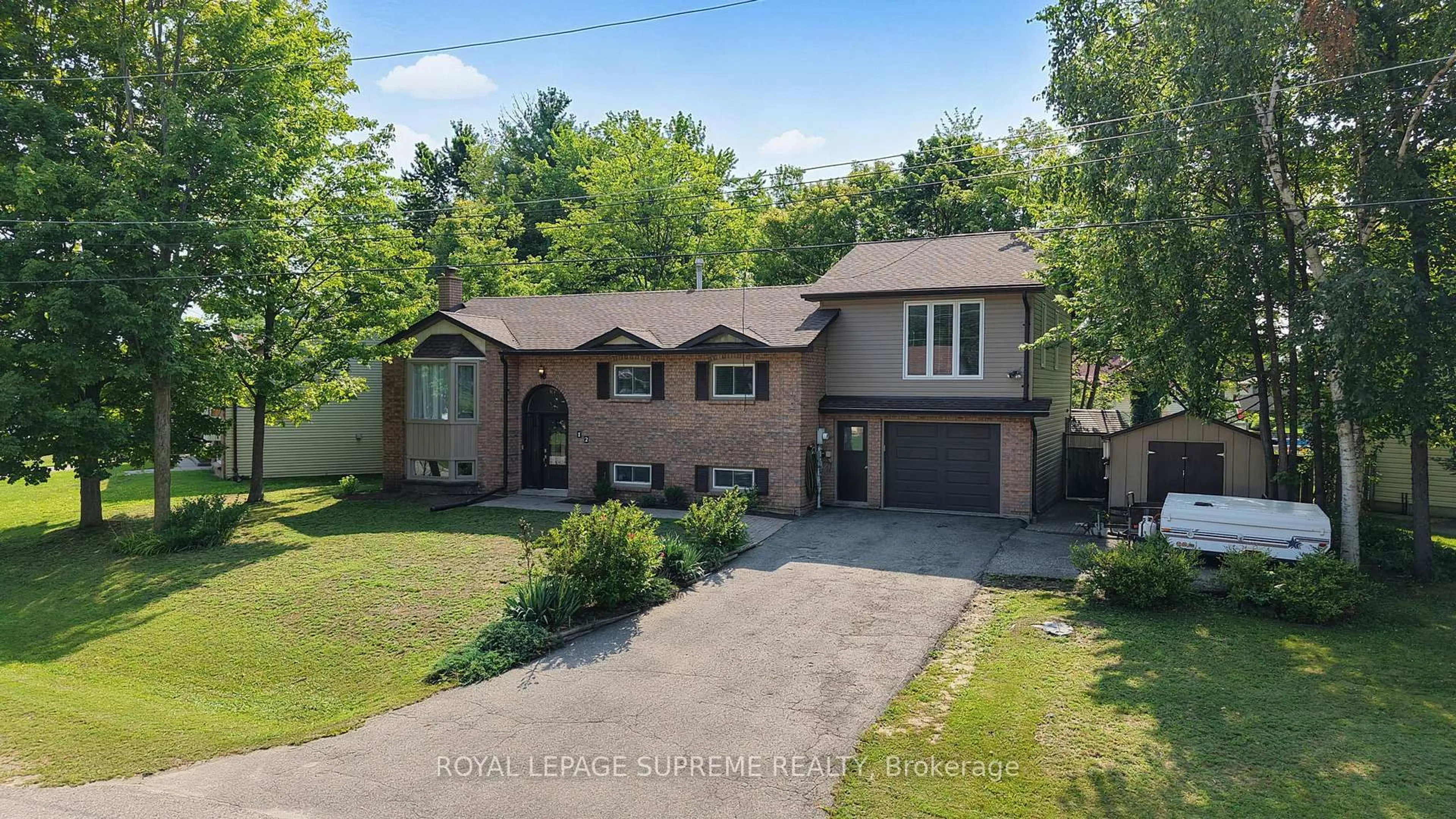 A pic from outside/outdoor area/front of a property/back of a property/a pic from drone, street for 12 Pridham Cres, Essa Ontario L3W 0G5