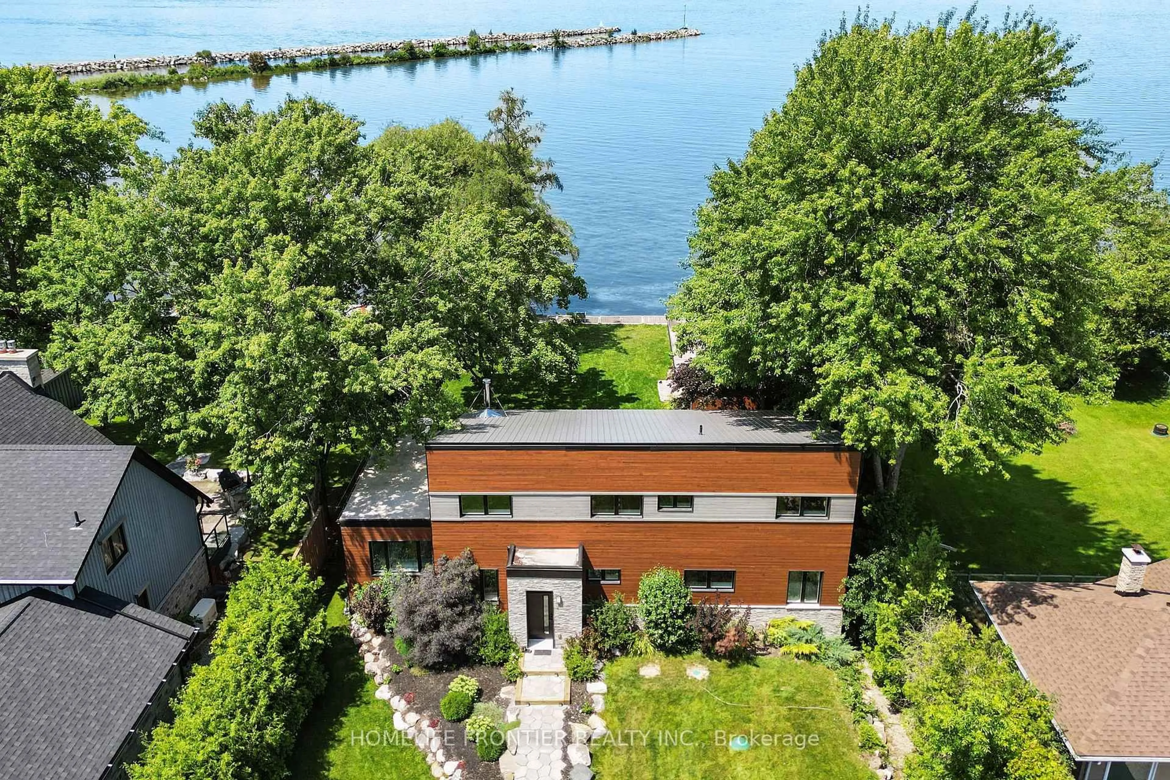 A pic from outside/outdoor area/front of a property/back of a property/a pic from drone, water/lake/river/ocean view for 44 Irving Dr, Georgina Ontario L0E 1N0
