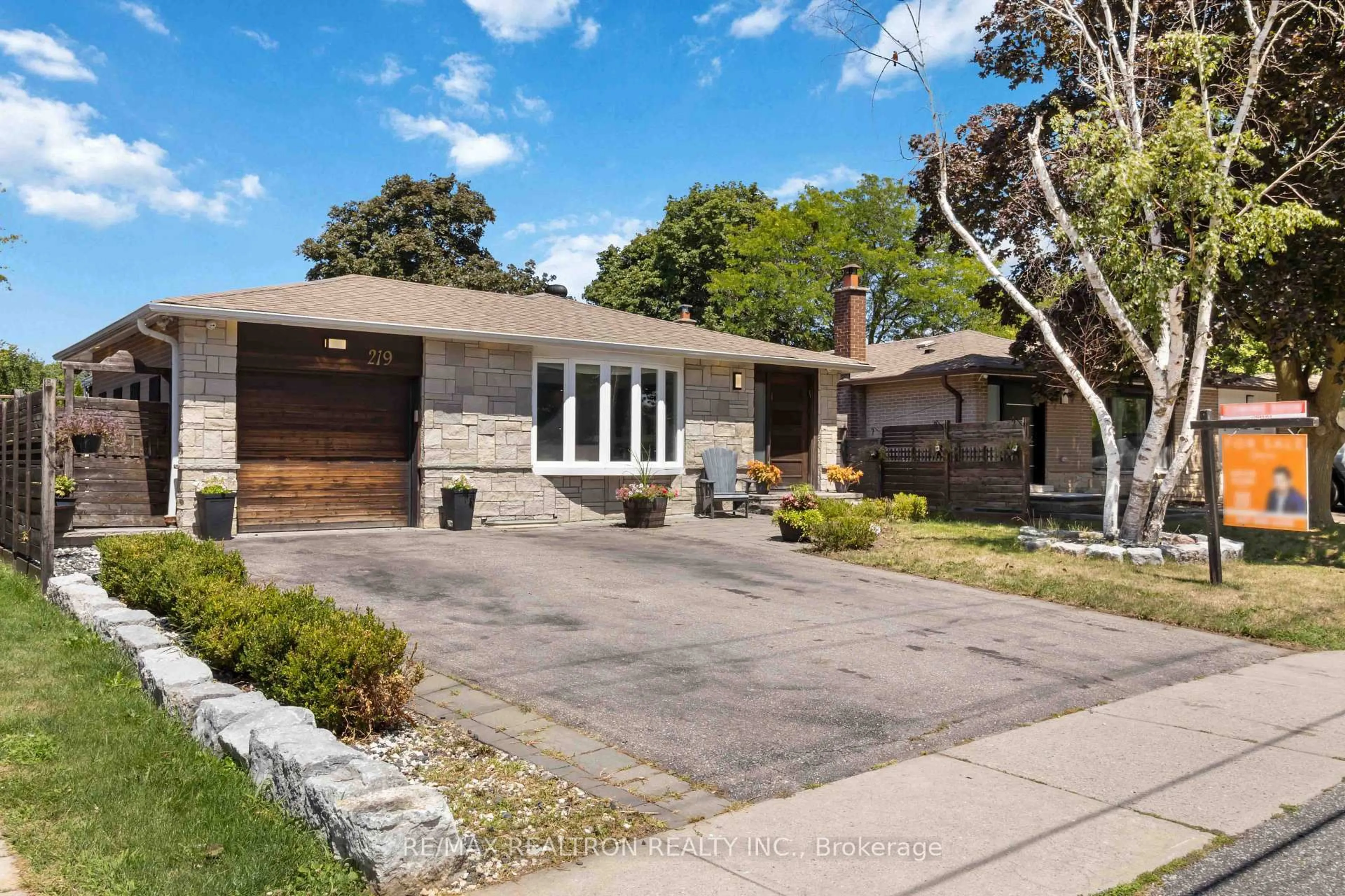 Home with brick exterior material, street for 219 Bay Thorn Dr, Markham Ontario L3T 3V6