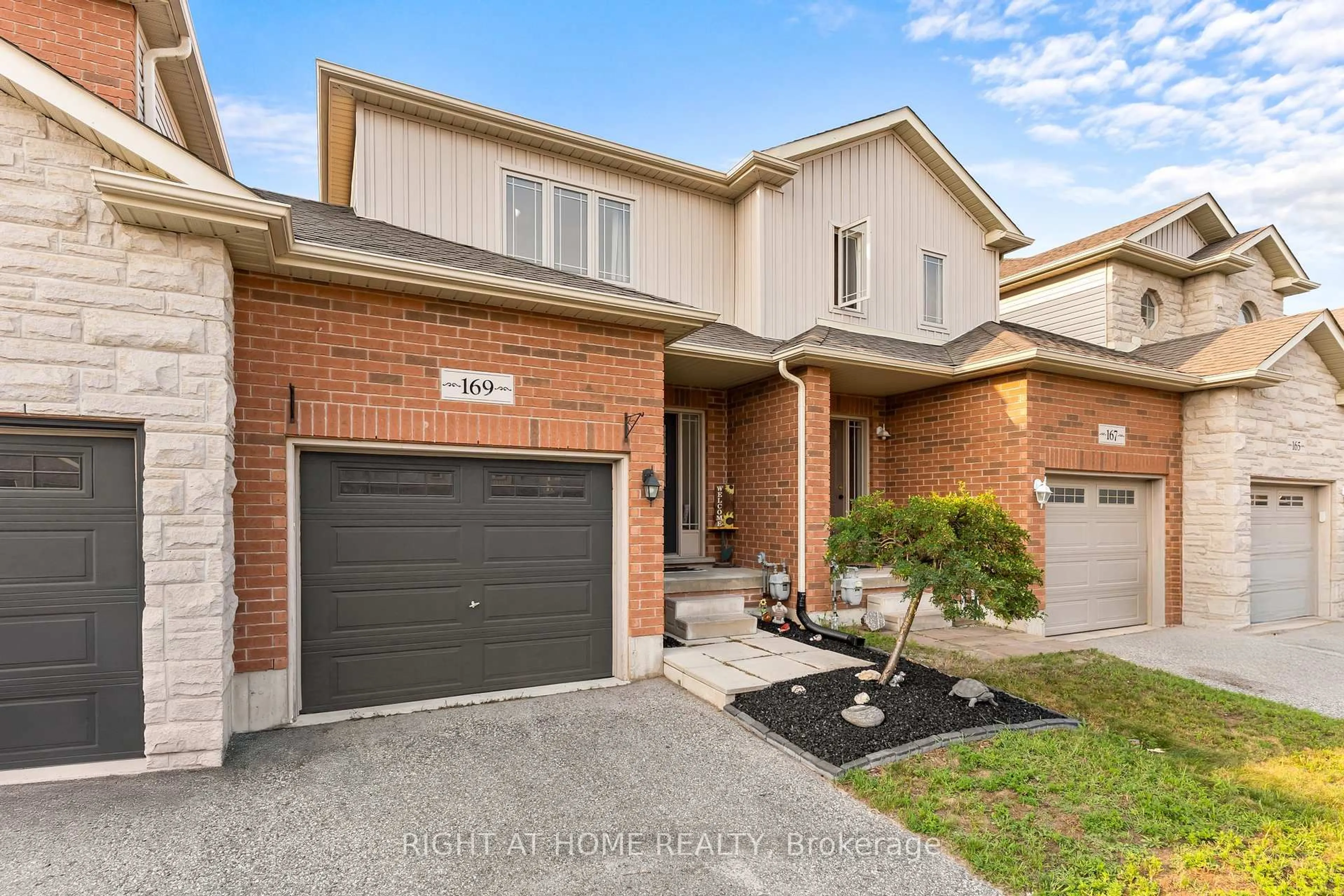 Home with brick exterior material, street for 169 Banting Cres, Essa Ontario L3W 0P3