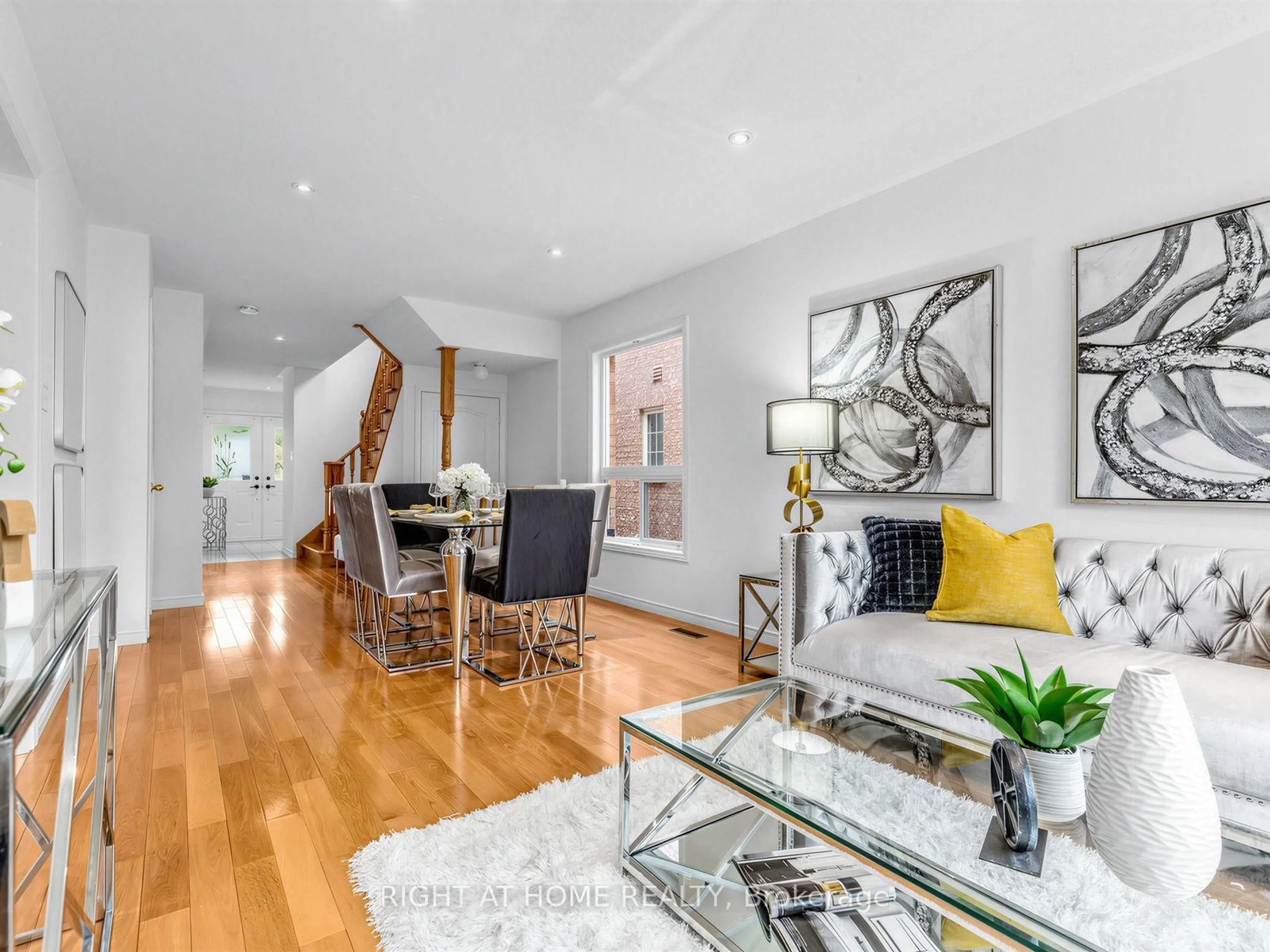 Living room with furniture, wood/laminate floor for 81 Briarcrest Dr, Markham Ontario L6C 3E7