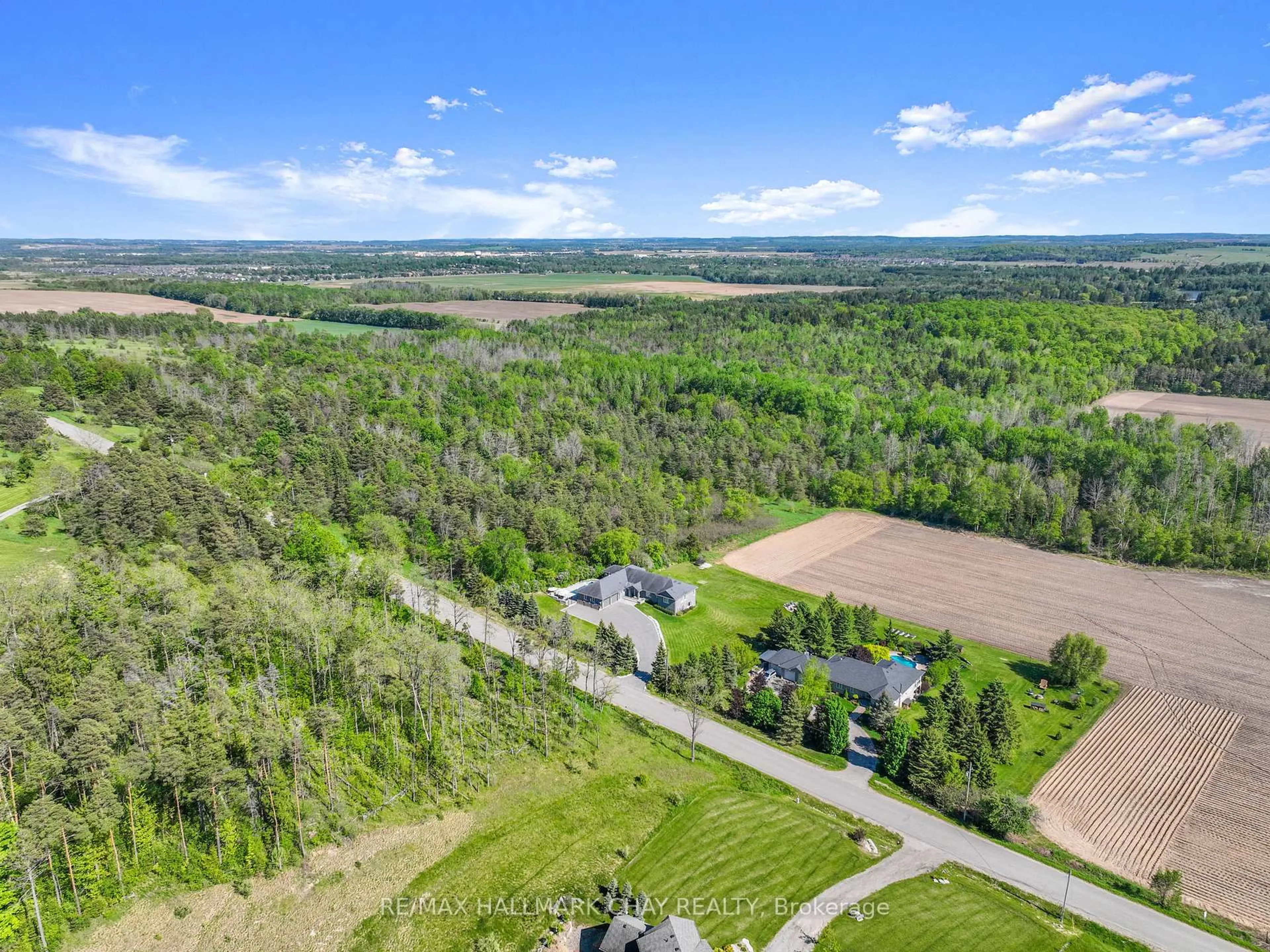 A pic from outside/outdoor area/front of a property/back of a property/a pic from drone, forest/trees view for 7765 5 Sideroad Tosorontio, Adjala-Tosorontio Ontario L9R 1V3