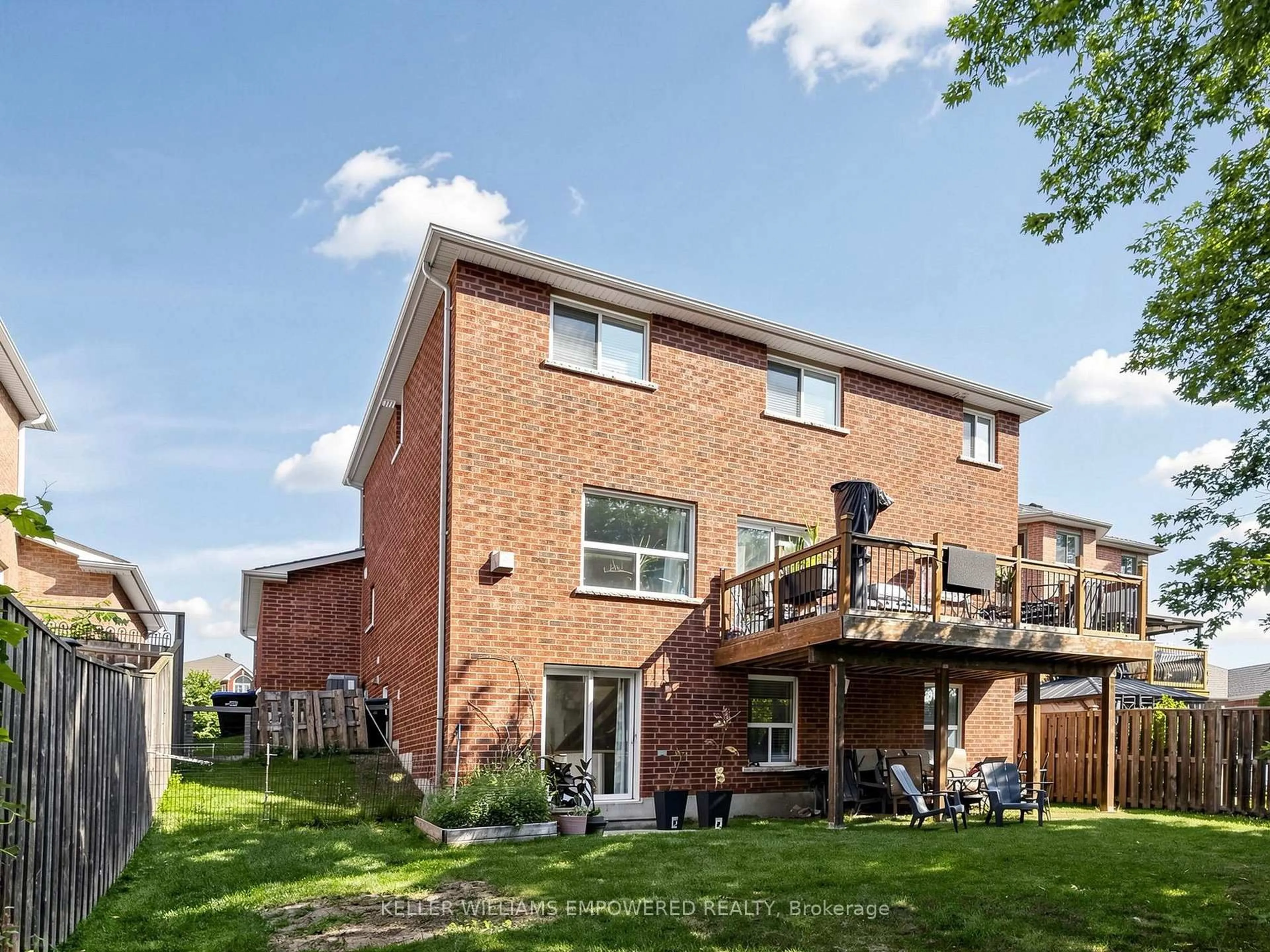 Home with brick exterior material, street for 135 Buchanan Dr, New Tecumseth Ontario L9R 0A4