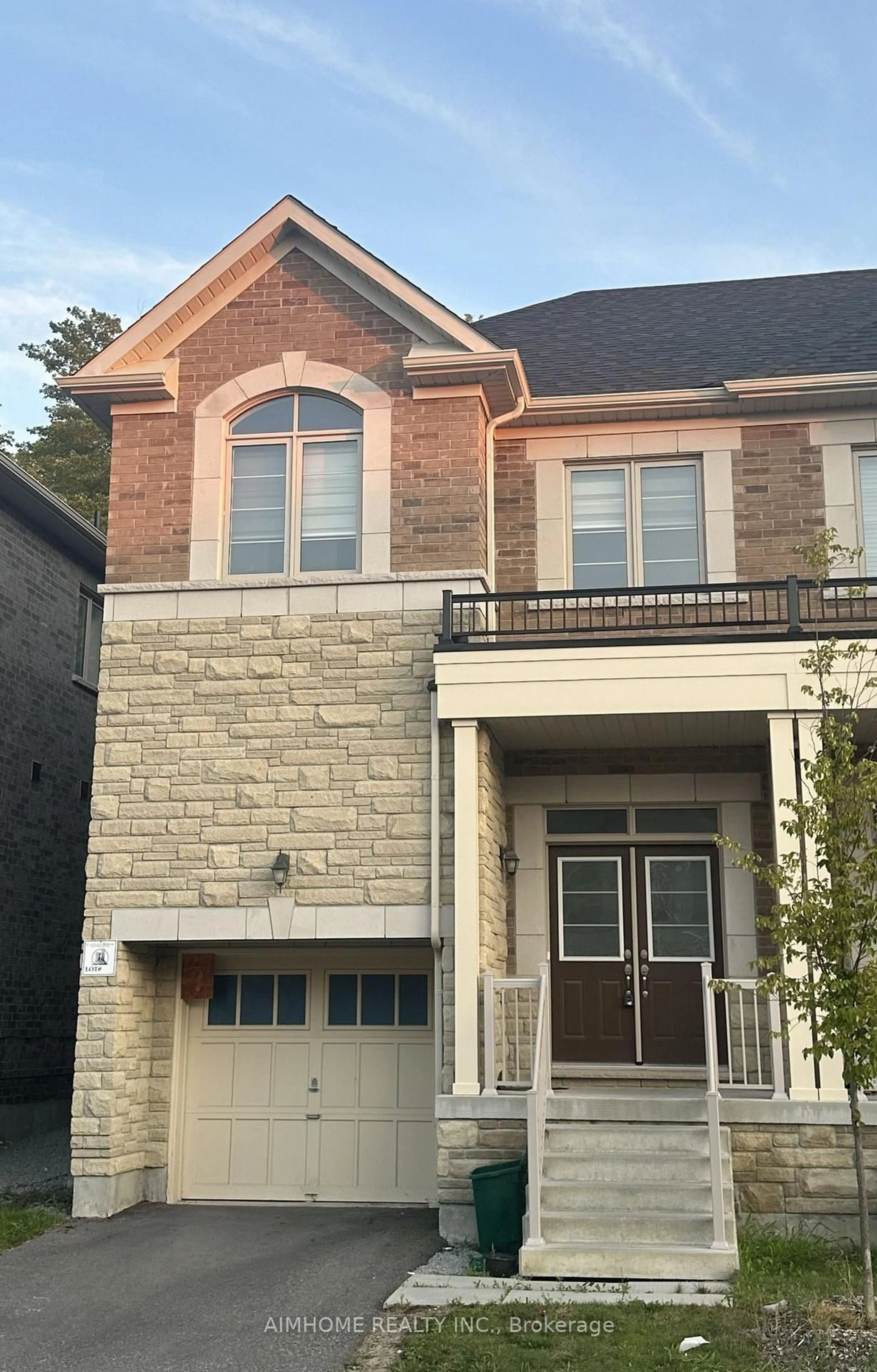 Home with brick exterior material, street for 52 Liam Lane, Markham Ontario L3S 0E8