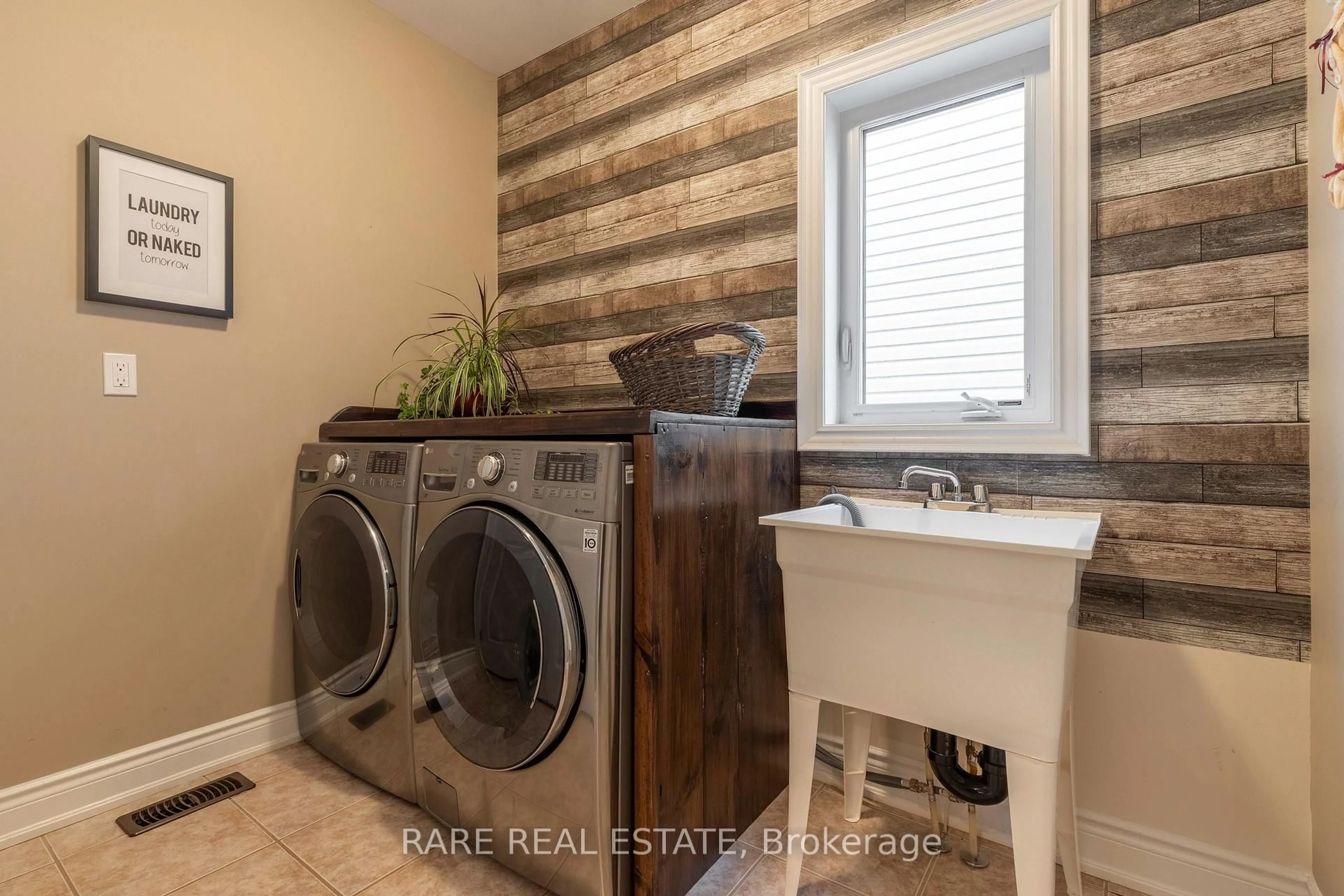 Laundry room for 101 Decarolis Cres, Essa Ontario L3W 0B1